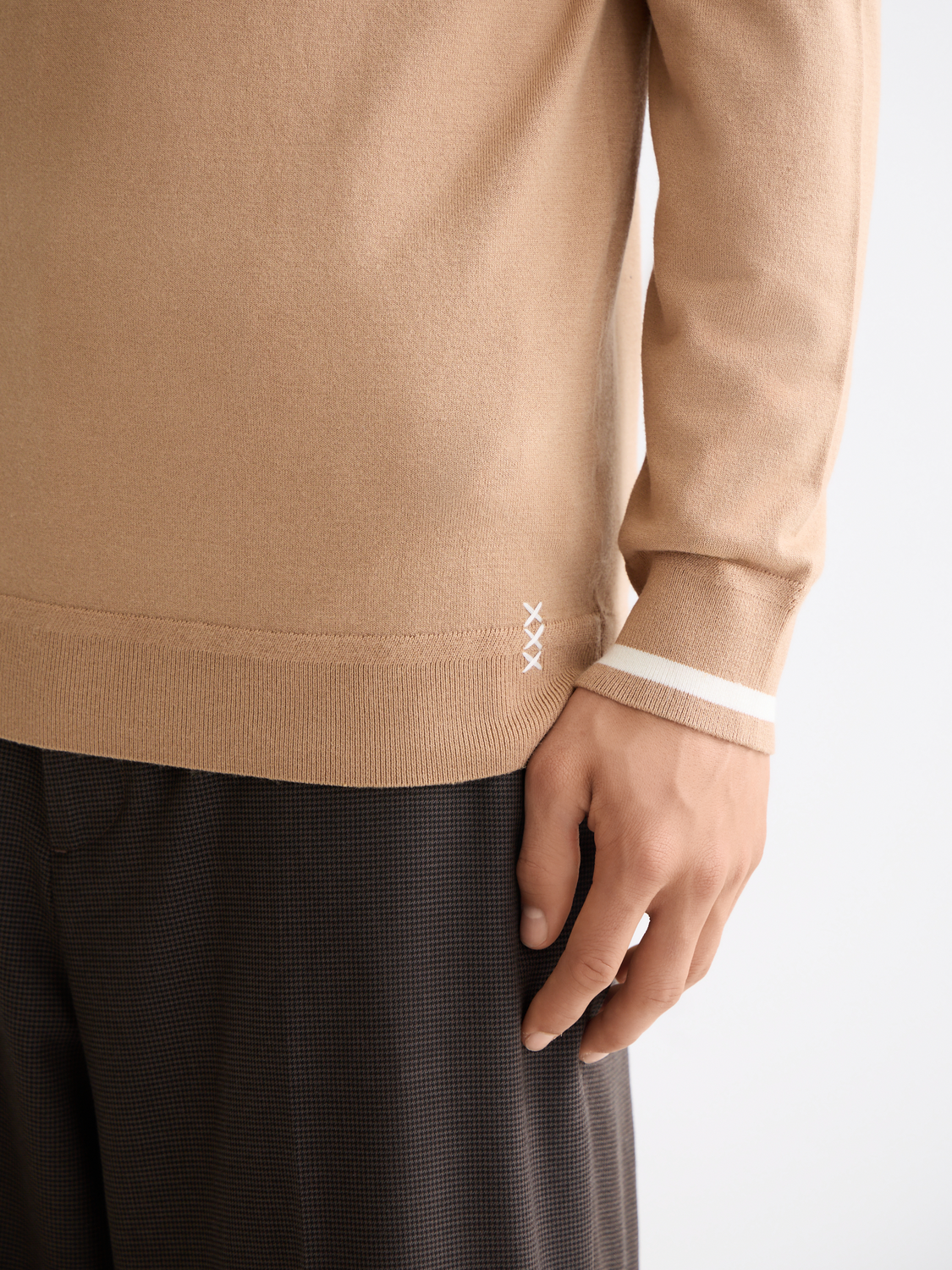 Blue knitted long-sleeved polo shirt by Scotch & Soda, featuring a classic collar and textured knit fabric.