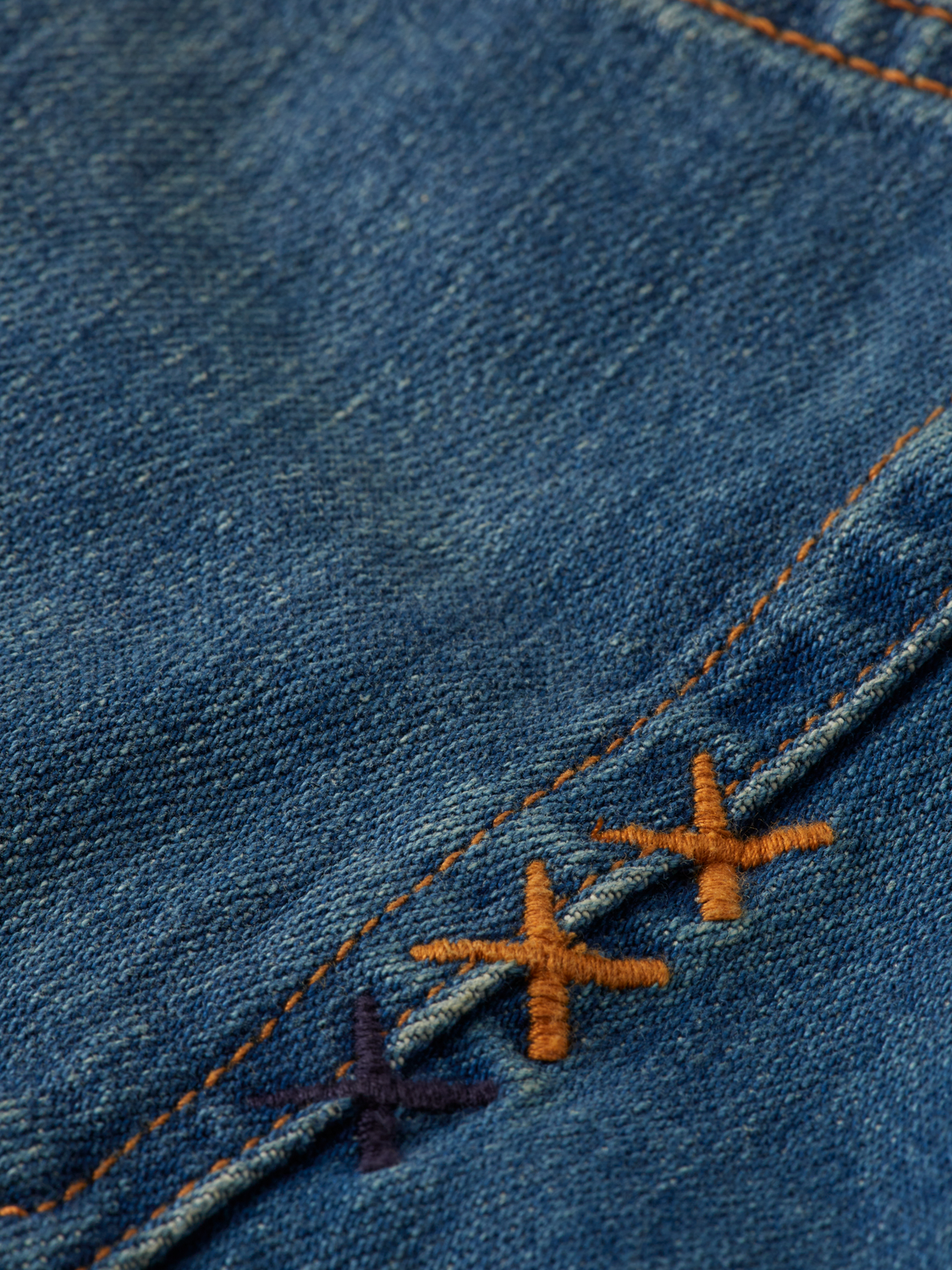 Scotch & Soda Dean tapered denim jeans showing slim fit design and classic blue wash with subtle fading.