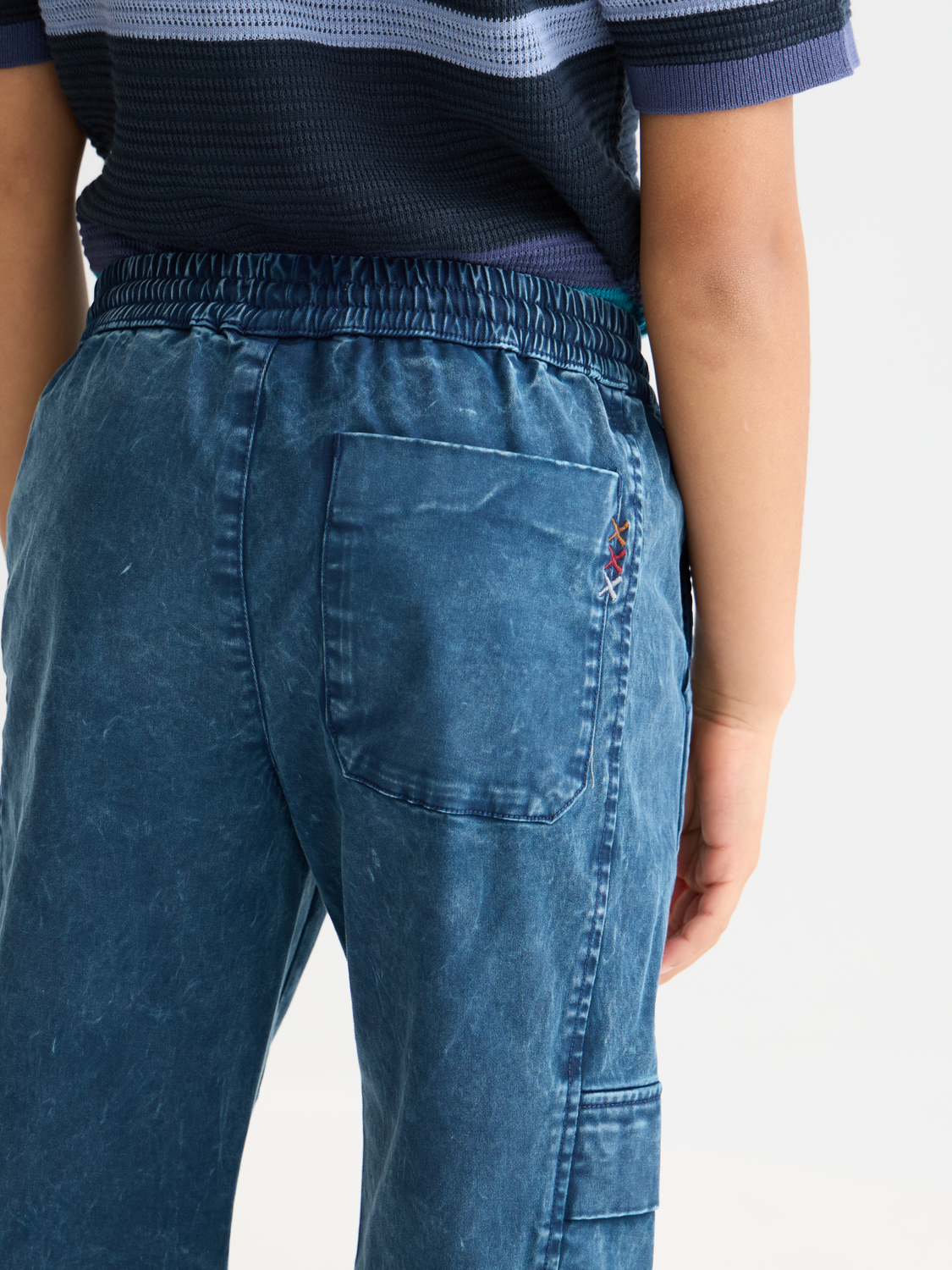 Kids' garment-dyed pants by Scotch & Soda, soft cotton, relaxed fit, in vibrant blue color with elastic waistband.