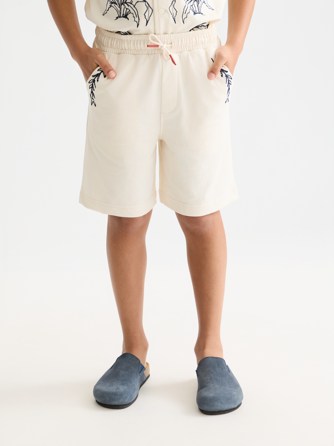 Kids' printed sweatshorts by Scotch & Soda featuring colorful patterns and comfortable fabric, perfect for casual wear.