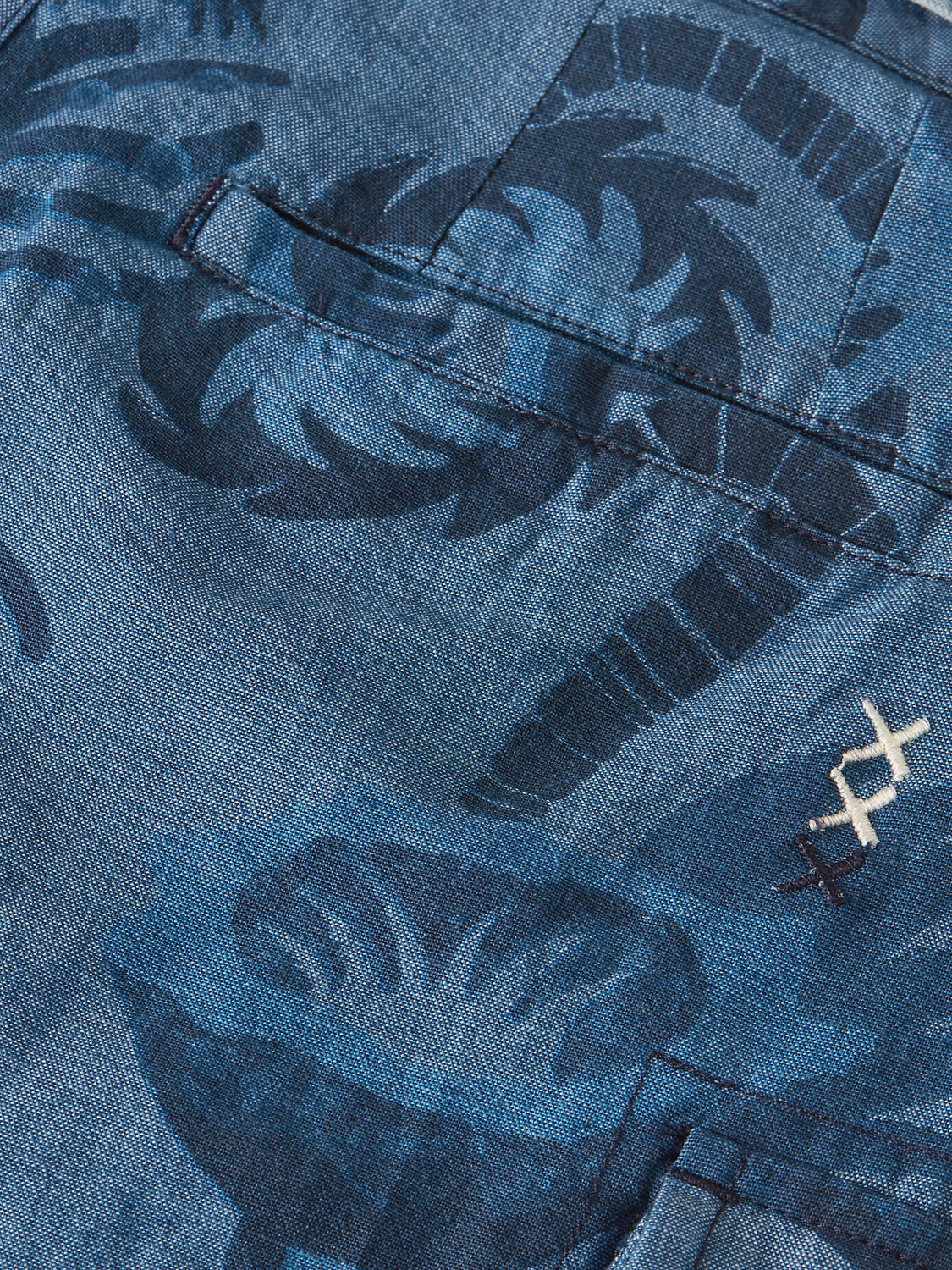 Kids' denim shorts by Scotch & Soda with colorful printed design, casual fit, and classic five-pocket style.