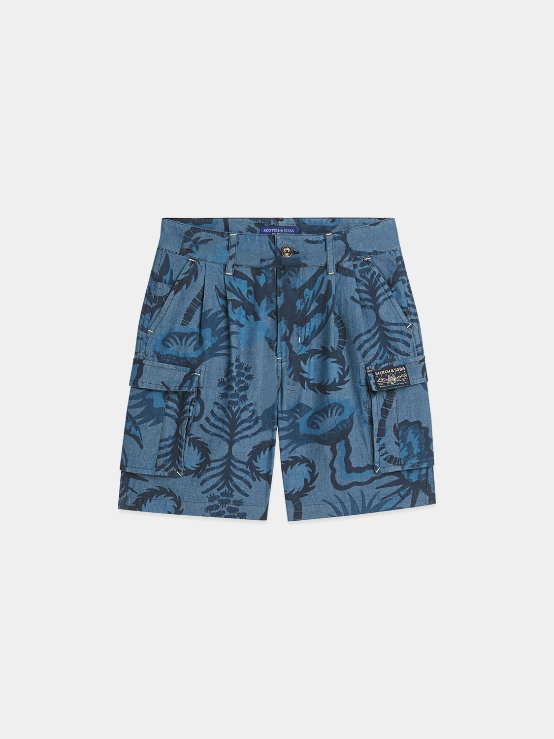 Kids denim shorts by Scotch & Soda with colorful printed design, shown in a close-up image of the shorts' fabric and pattern.