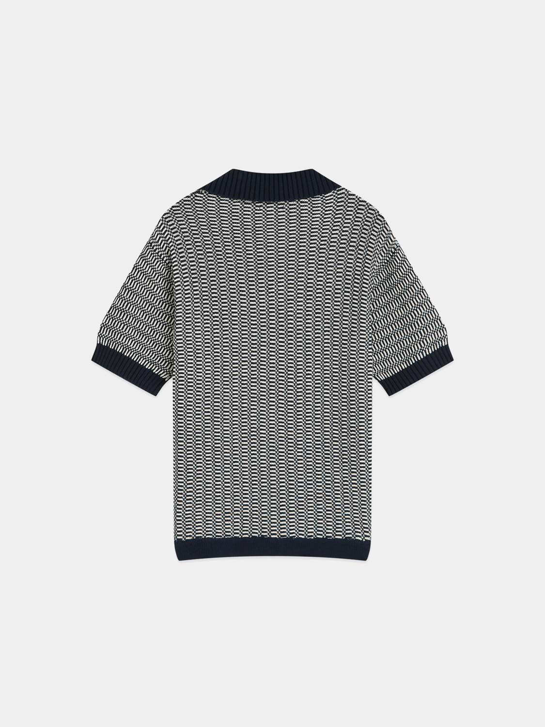 Kids' knitted polo shirt by Scotch & Soda, featuring a classic collar and button detail in navy blue.
