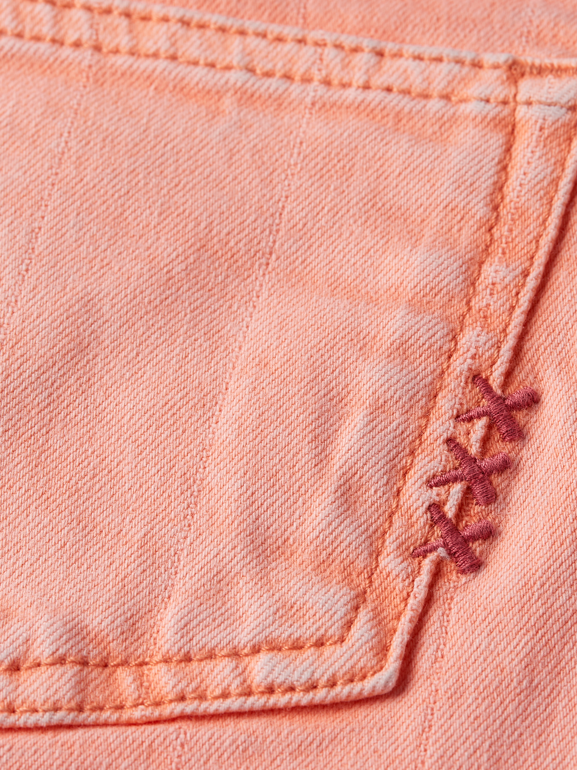 Kids' Ray denim shorts by Scotch & Soda, featuring classic blue denim with rolled cuffs and front pockets.
