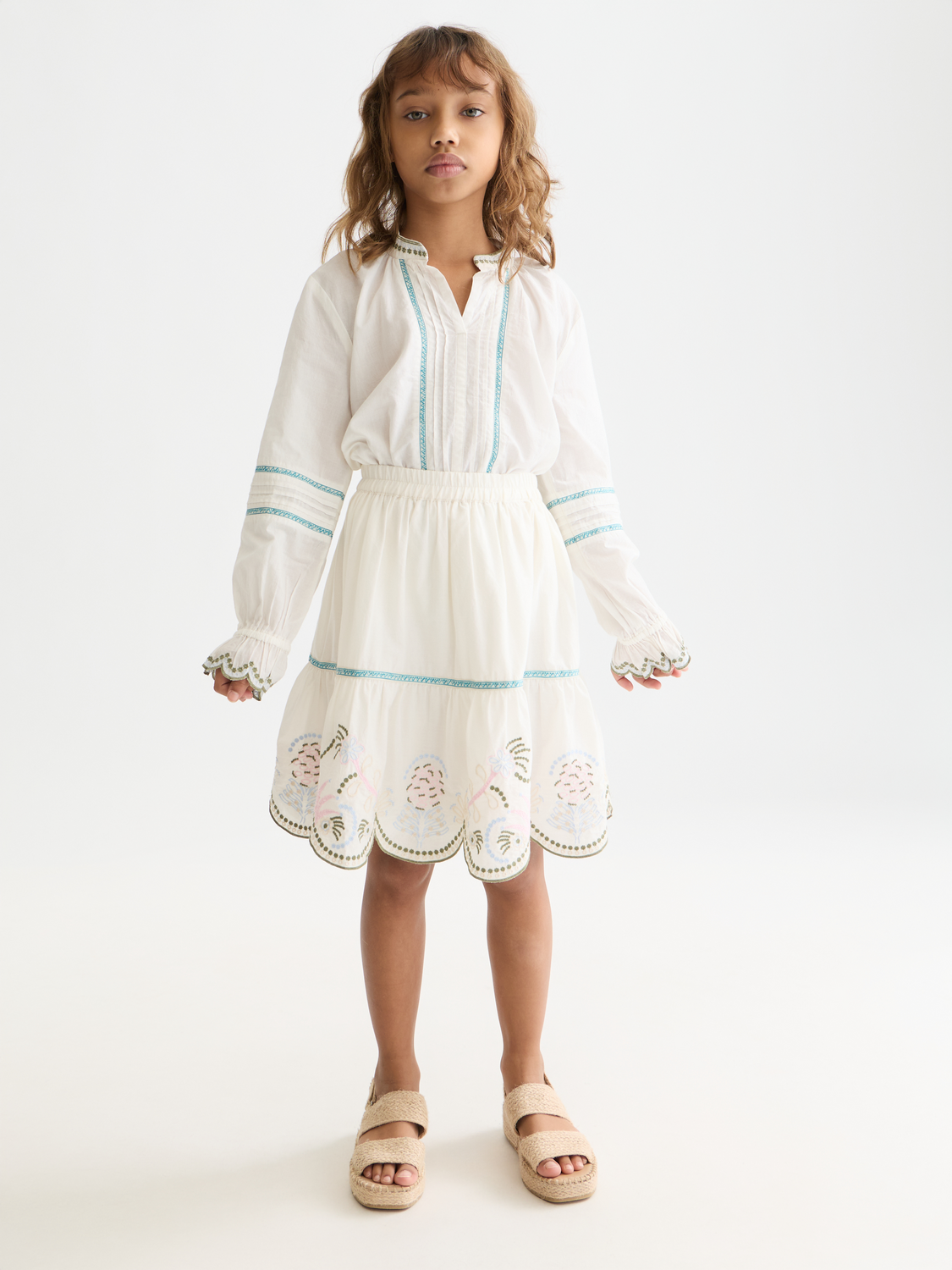 Kids' embroidered skirt by Scotch & Soda featuring colorful floral embroidery and a playful, casual design.