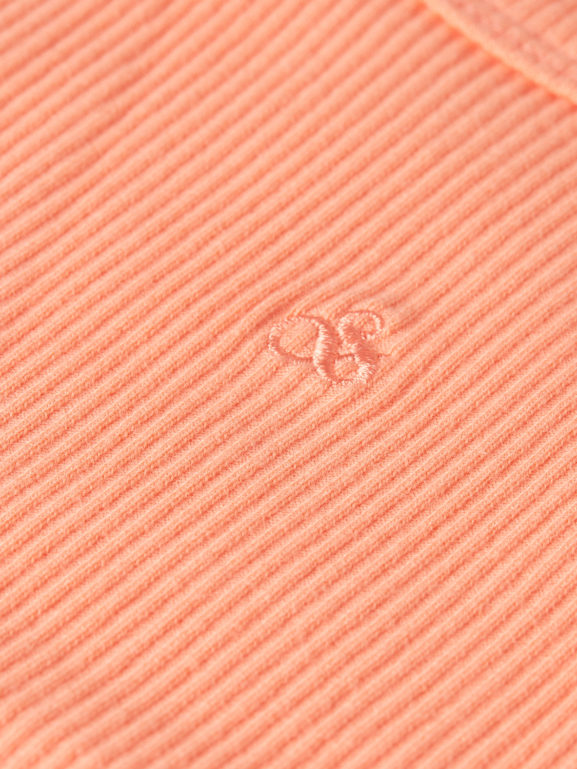 Kids' ribbed tank top by Scotch & Soda, pink sleeveless shirt with ribbed fabric, suitable for casual wear.