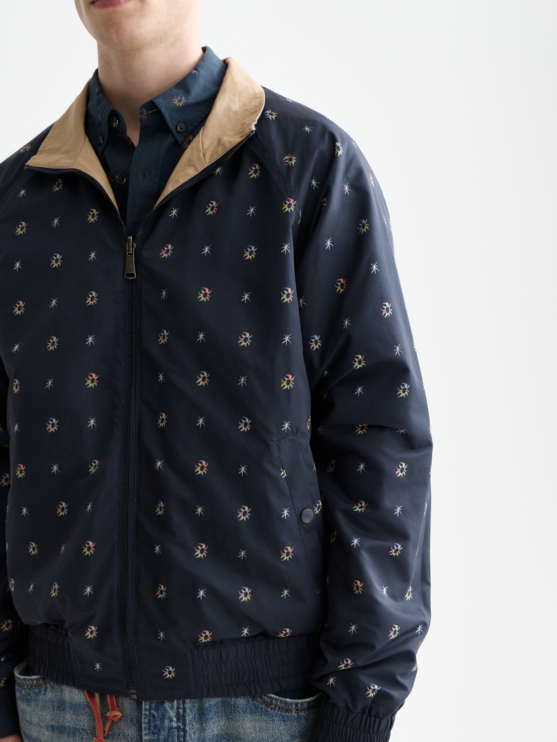 Reversible Scotch & Soda jacket showing both solid and patterned sides, lightweight and stylish for versatile wear.