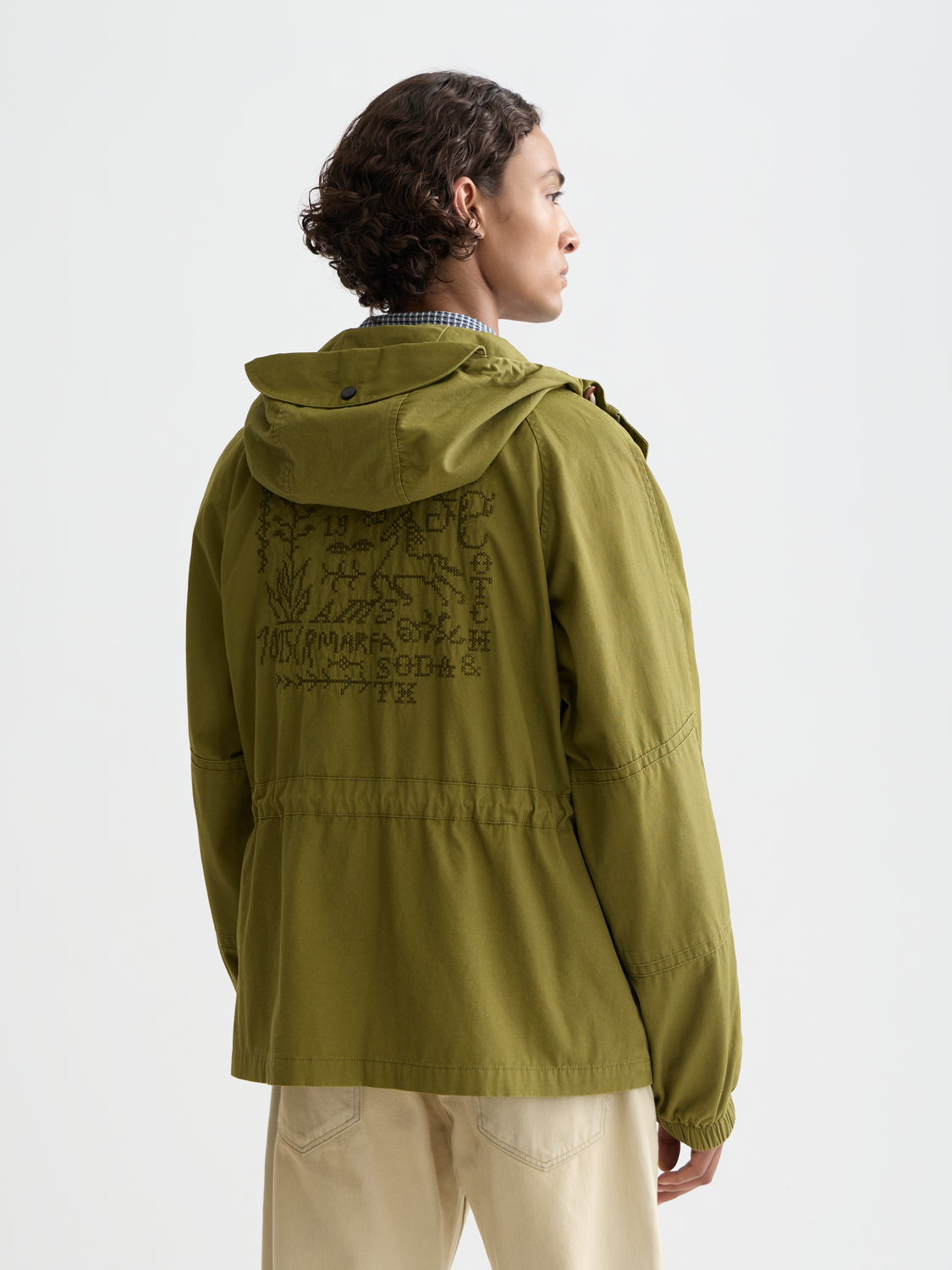 Heritage Scotch & Soda smock jacket with front pockets, button closure, and relaxed fit, displayed on a neutral background.