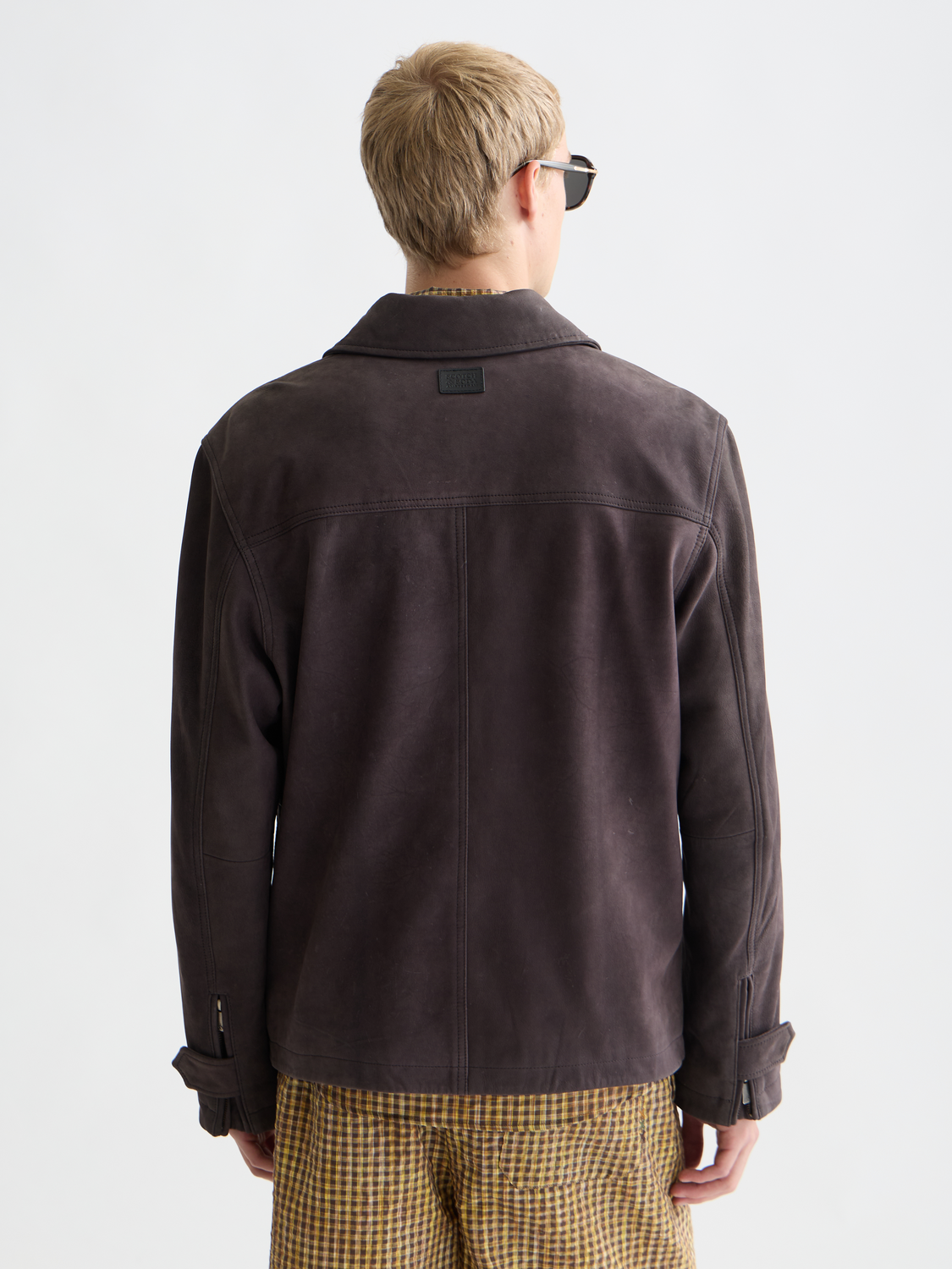 SCOTCH & SODA suede leather jacket showing back view with smooth texture and stylish design.