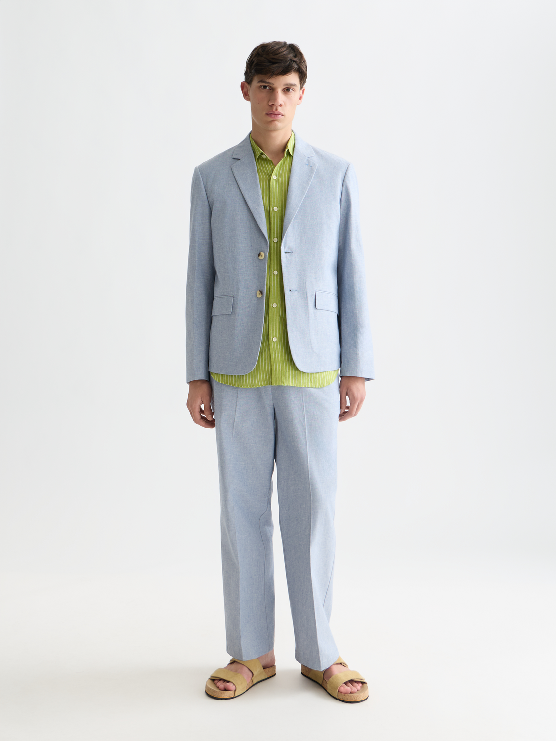 Unconstructed Scotch & Soda blazer in a tailored fit, featuring classic lapels and minimal design, displayed on a plain background.