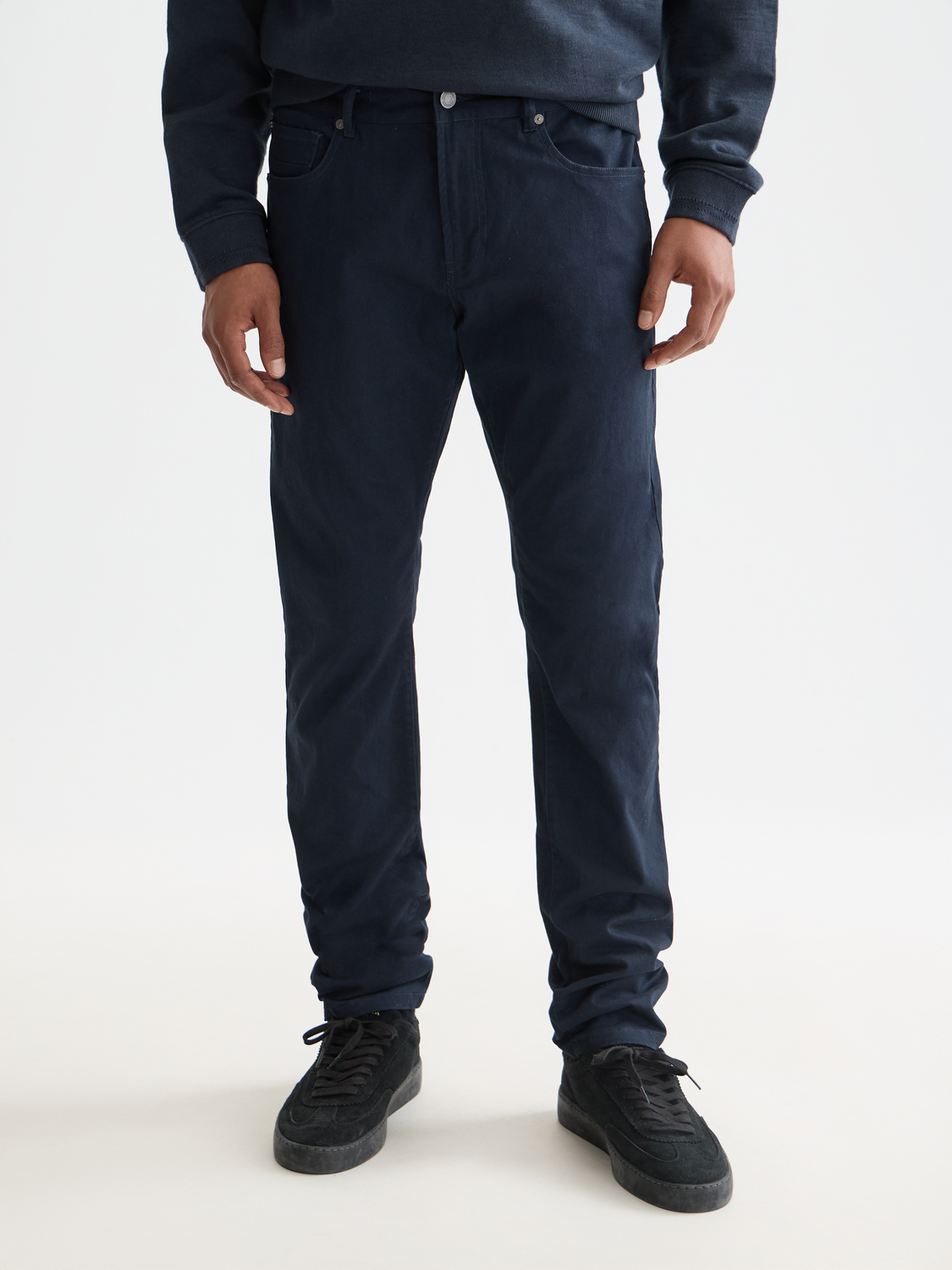 Slim-fit Ralston pants by Scotch & Soda, featuring a sleek design and tailored fit, shown in a stylish front view.