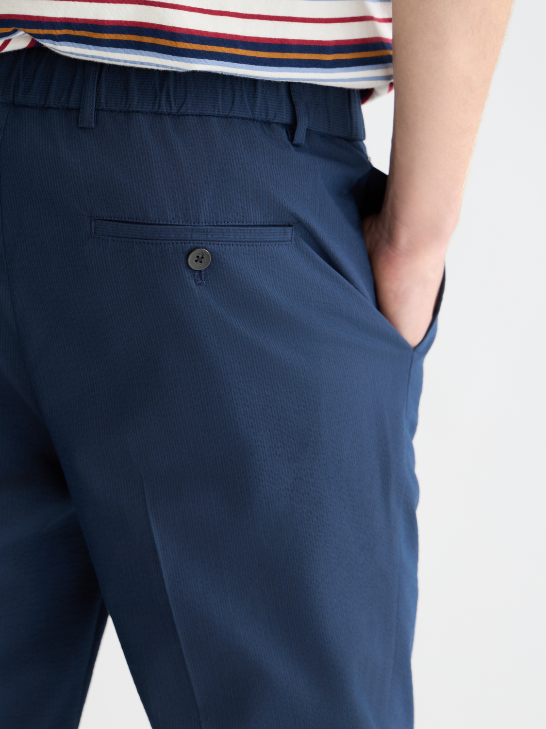 Scotch & Soda Warren seersucker jogger pants with a relaxed fit and light blue and white striped fabric.