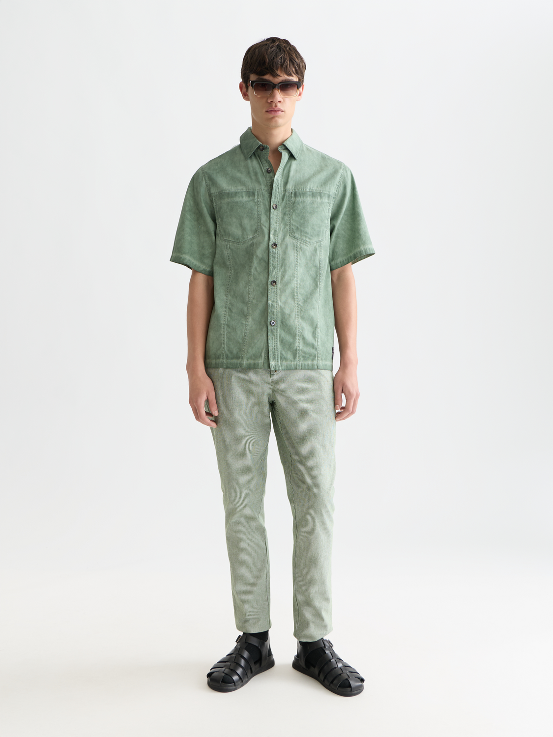 SCOTCH & SODA Warren joggers pants in a relaxed fit with adjustable drawstring waistband and cuffed ankles.
