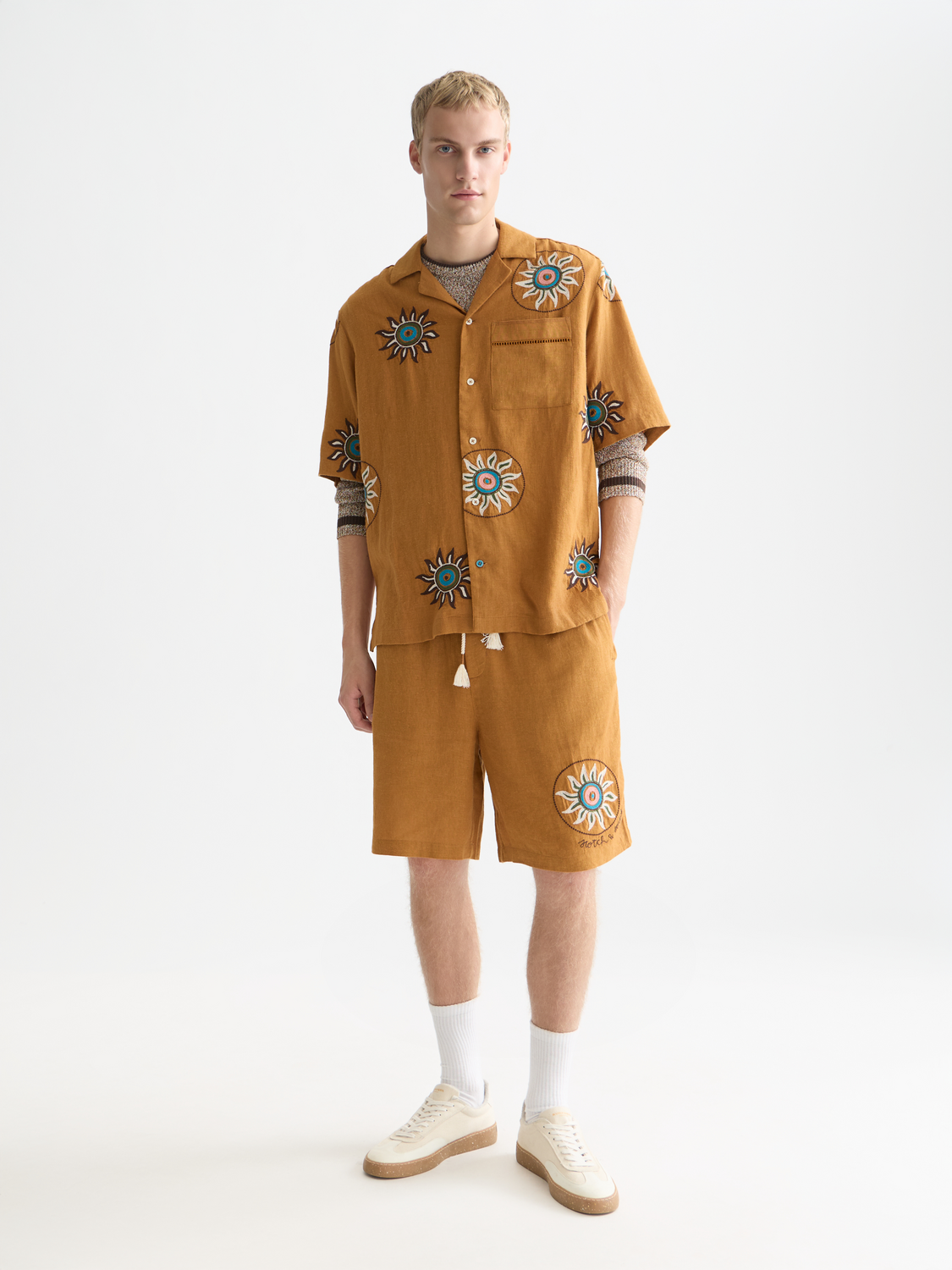 Embroidered SCOTCH & SODA shorts with intricate floral designs, lightweight fabric, and comfortable fit for casual wear.