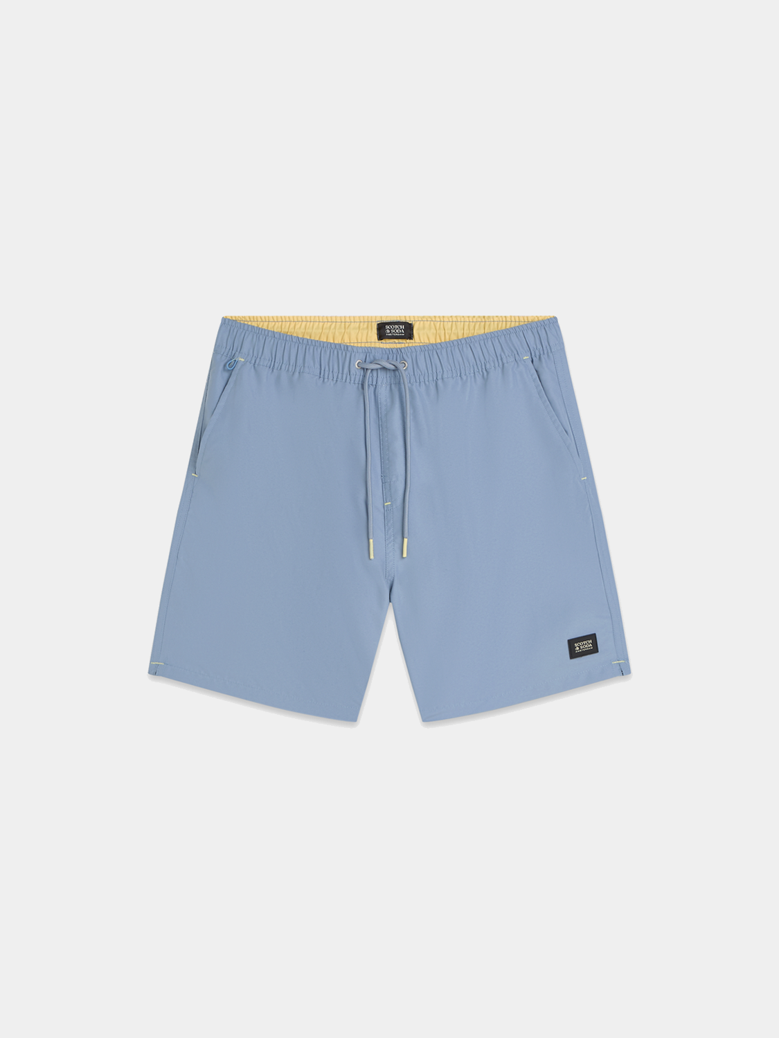 Mid-length Scotch & Soda swimshorts in vibrant print, featuring elastic waistband and side pockets, ideal for beach and pool wear.