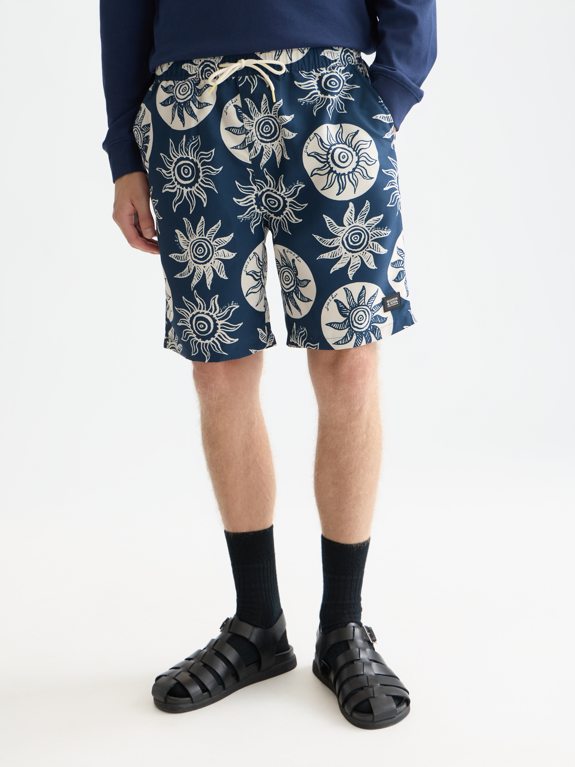 Printed SCOTCH & SODA swimshorts with vibrant floral pattern, lightweight swimwear designed for beach or poolside wear.