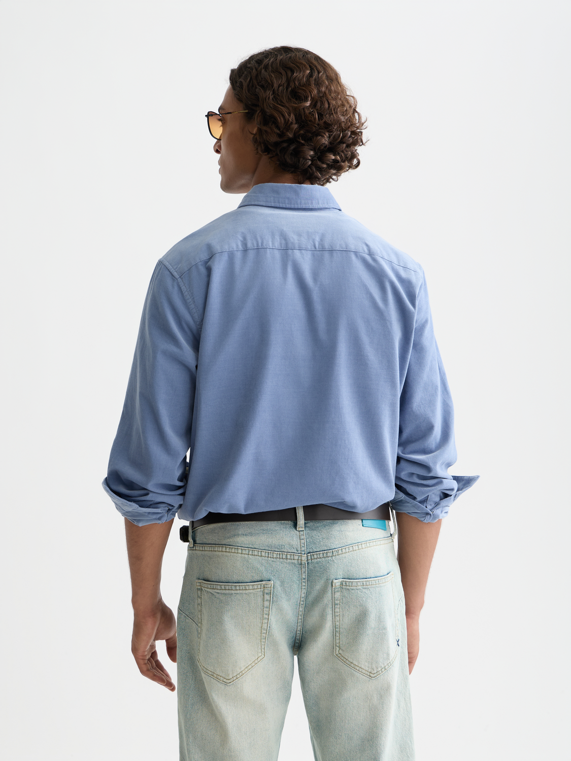 Lightweight navy corduroy long-sleeve shirt from Scotch & Soda, shown from the back with textured fabric and classic fit.