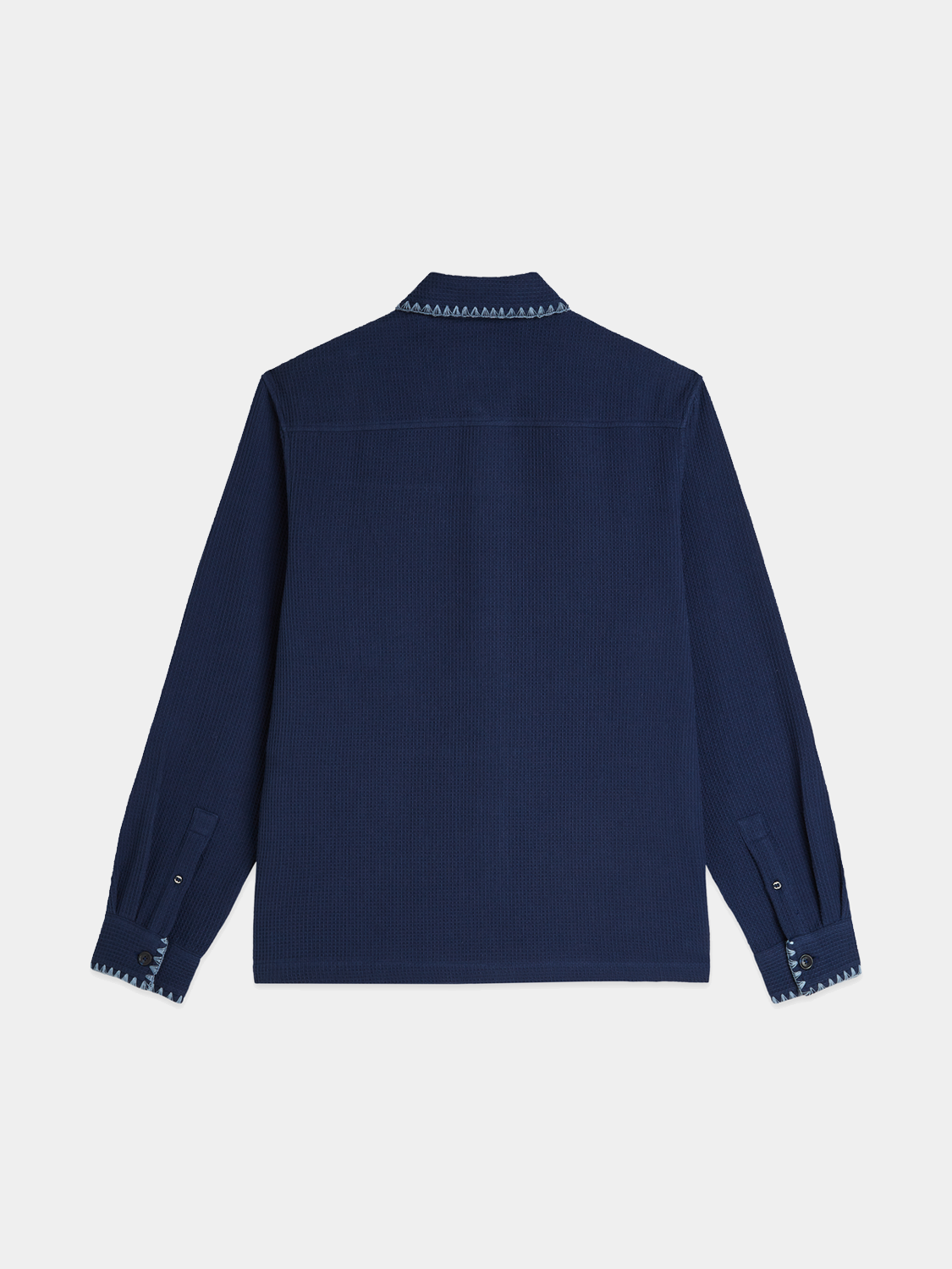 Long sleeve Scotch & Soda waffle-structured shirt in dark color, featuring a textured fabric and casual fit.