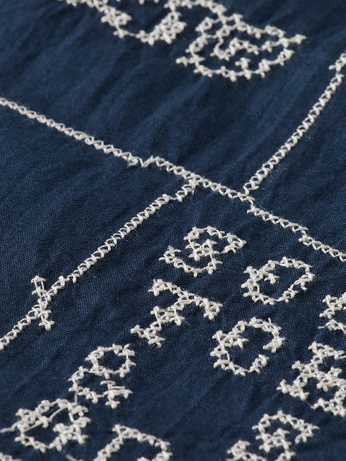 Long sleeve embroidered shirt by Scotch & Soda featuring detailed floral embroidery on soft fabric.