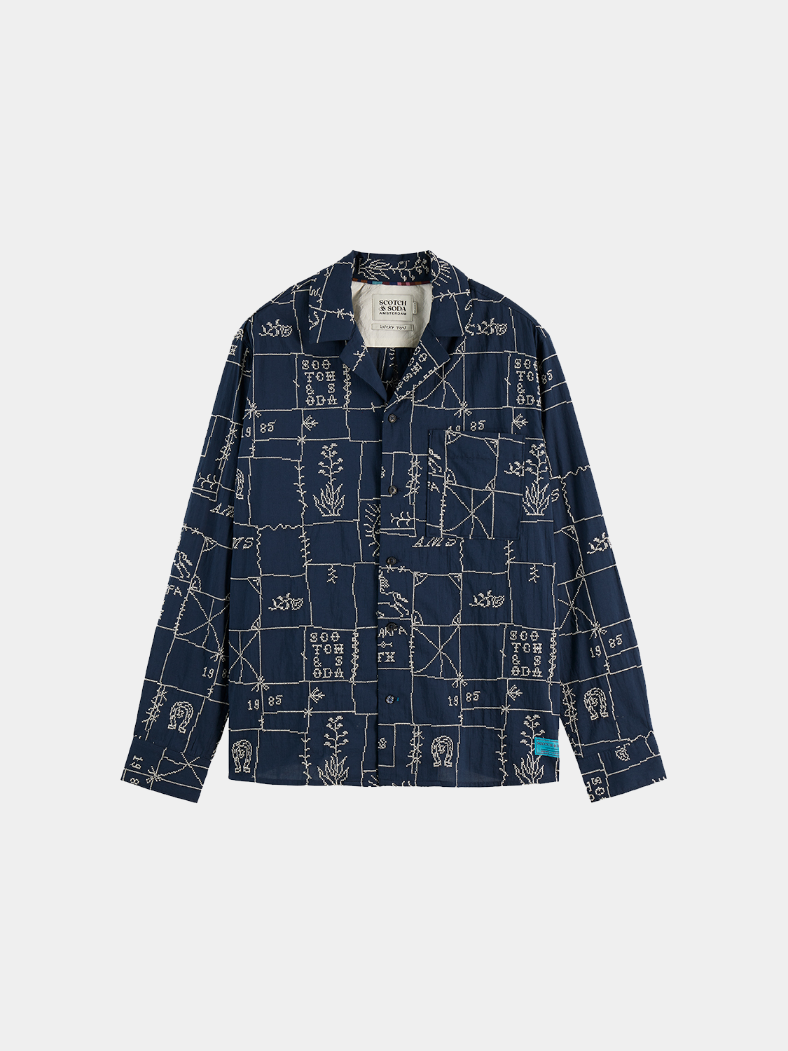 Long sleeve embroidered shirt by Scotch & Soda featuring intricate floral embroidery and a relaxed fit.
