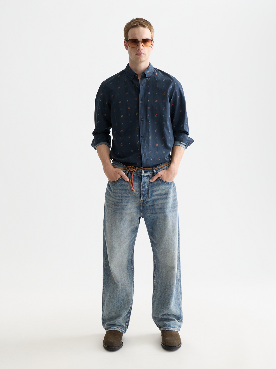 Long sleeve printed shirt by Scotch & Soda featuring a stylish pattern and classic fit, displayed on a hanger.