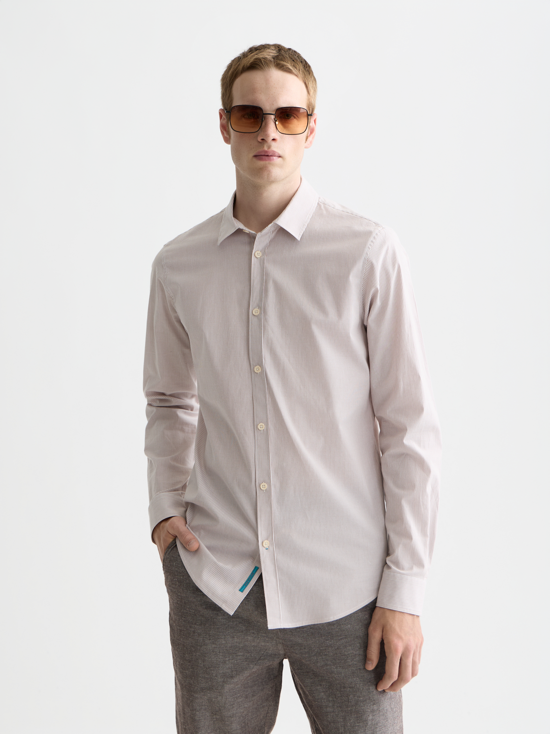 Long sleeve striped poplin shirt by Scotch & Soda, featuring a classic pattern and tailored fit.