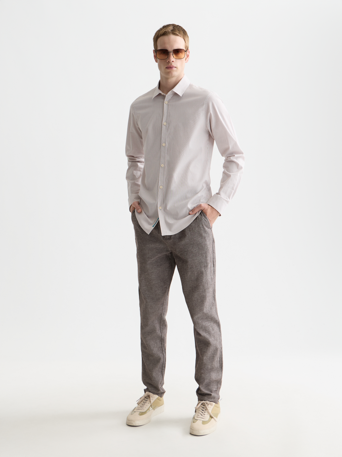 Long-sleeve striped poplin shirt by Scotch & Soda, featuring classic design and vibrant colors, front view.