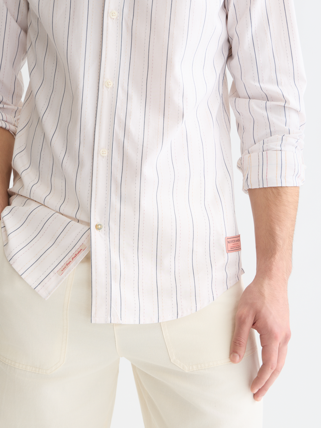 Long sleeve Scotch & Soda Dobby shirt featuring intricate patterned fabric and a classic collar on a mannequin.
