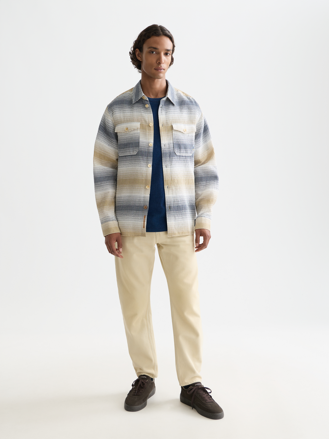 Long sleeve striped waffle shirt by Scotch & Soda, featuring a casual fit and textured fabric in a modern design.