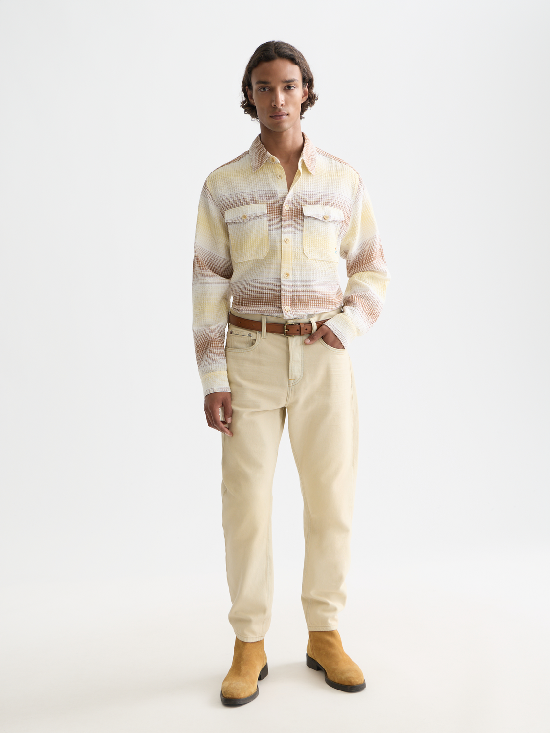 Long-sleeve striped waffle shirt by Scotch & Soda, showing a close-up of the textured fabric and classic pattern.