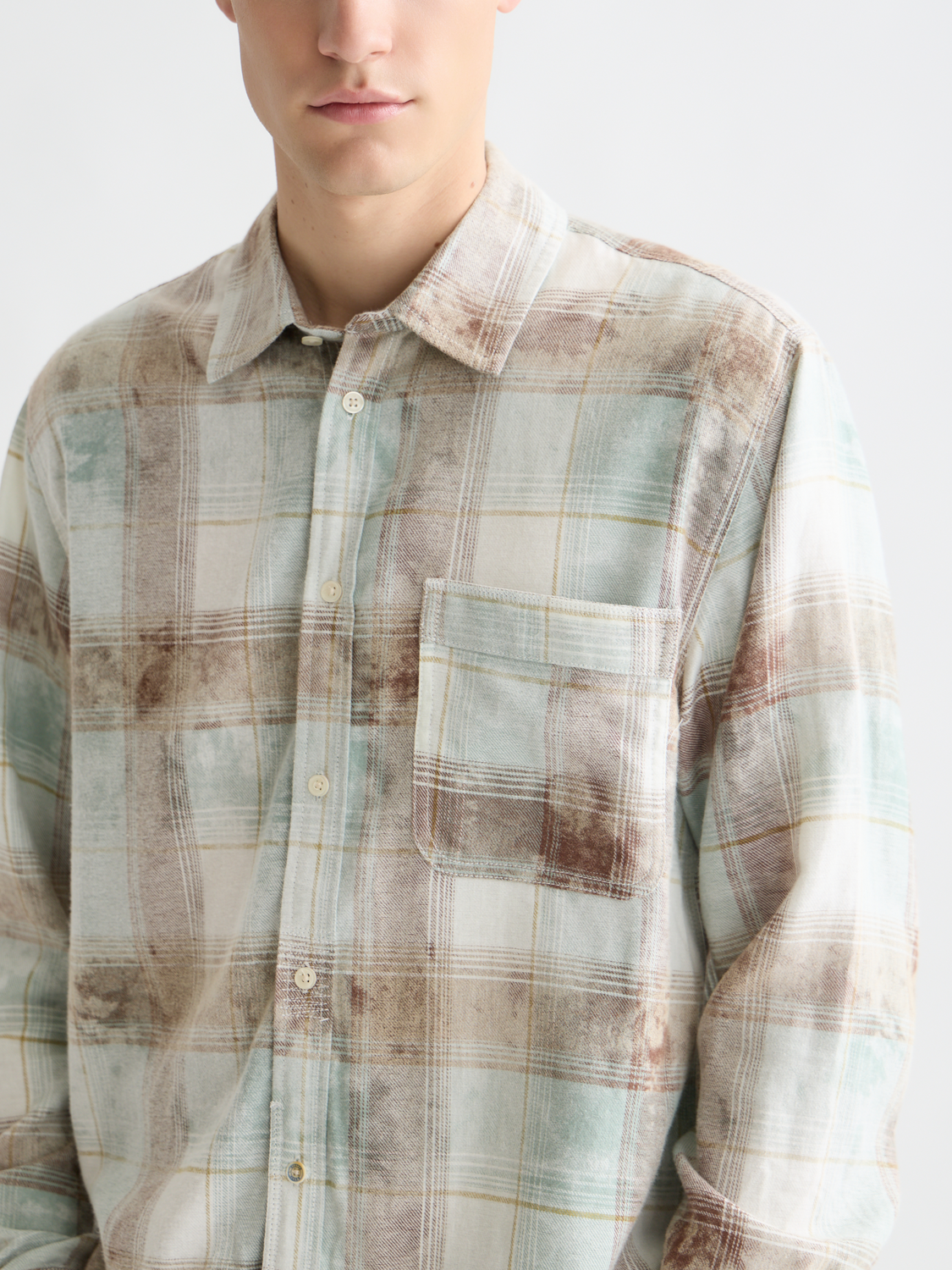 Long-sleeve washed check shirt by Scotch & Soda, featuring a casual plaid pattern and button-up front.
