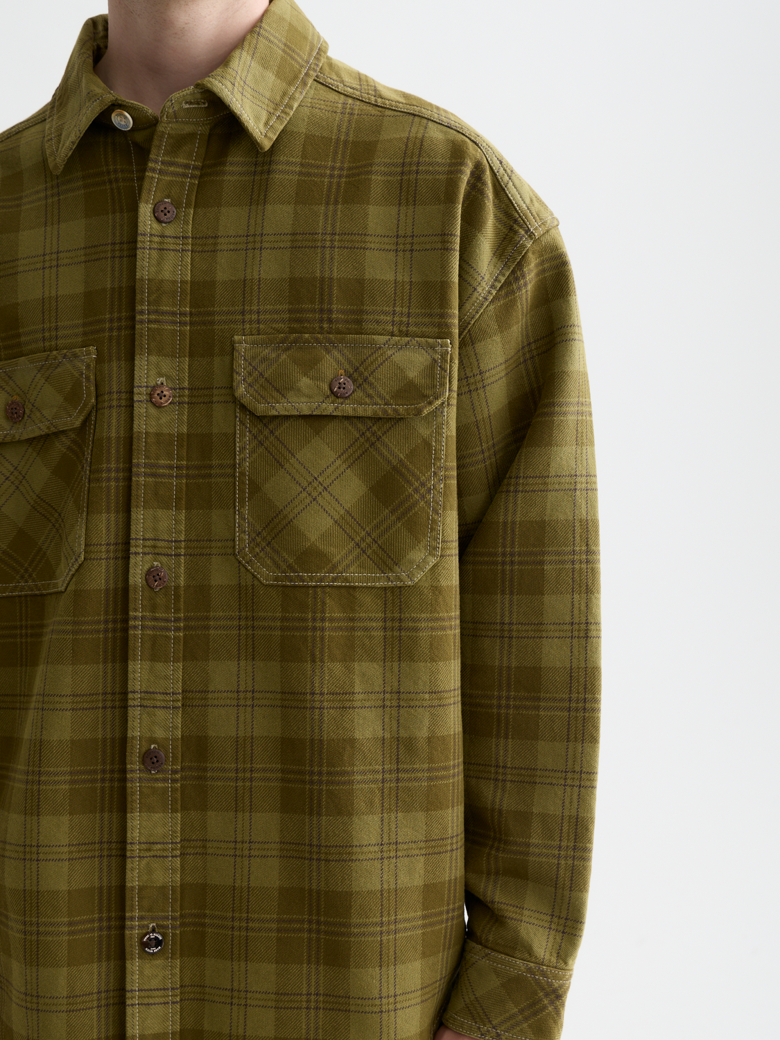 Scotch & Soda checked overshirt jacket with button front and long sleeves, casual outerwear in a classic plaid pattern.