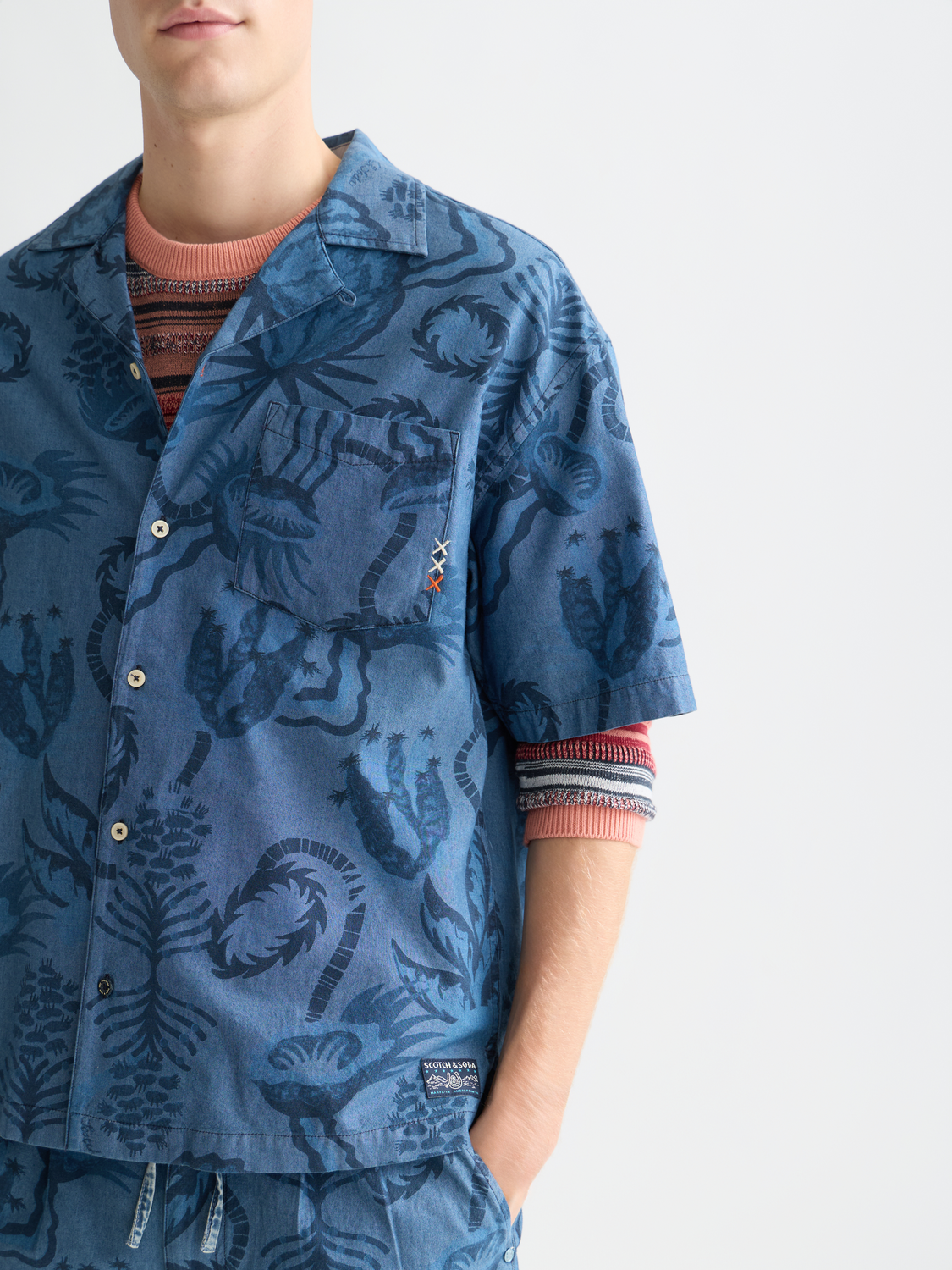 Printed short-sleeved shirt by Scotch & Soda featuring vibrant patterns and a classic fit, perfect for casual summer wear.