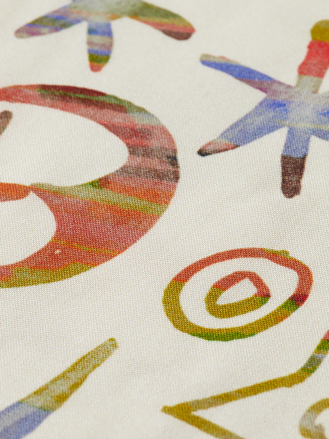 Printed short-sleeved shirt by Scotch & Soda featuring a vibrant design and casual fit on a neutral background.