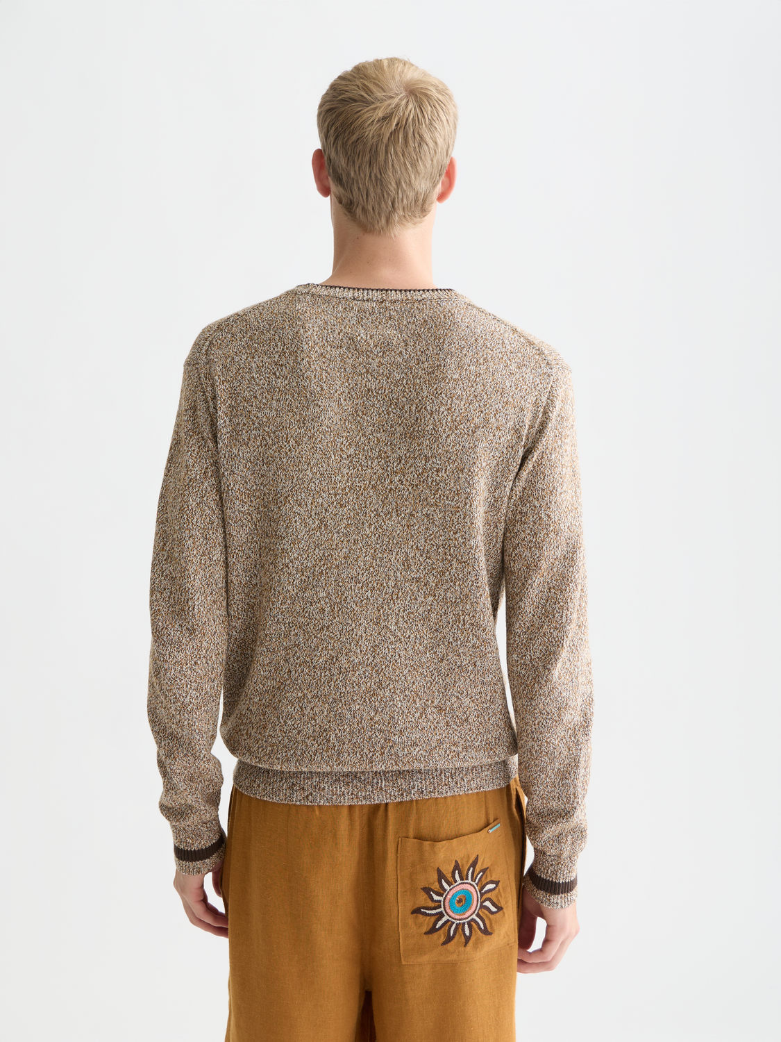 SCOTCH & SODA melange knitwear pullover with a cozy, textured fabric and a relaxed fit, shown from the back.