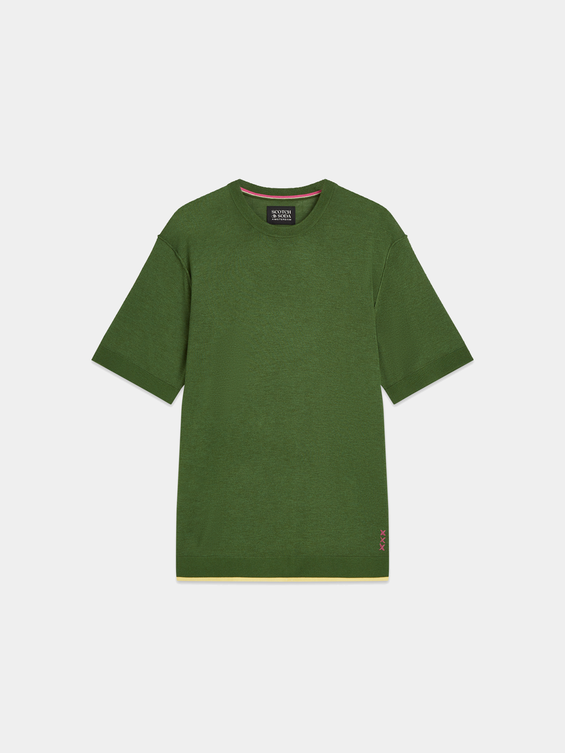 Close-up of a knitted T-shirt from Scotch & Soda, showcasing the textured knitwear fabric and detailed stitching.