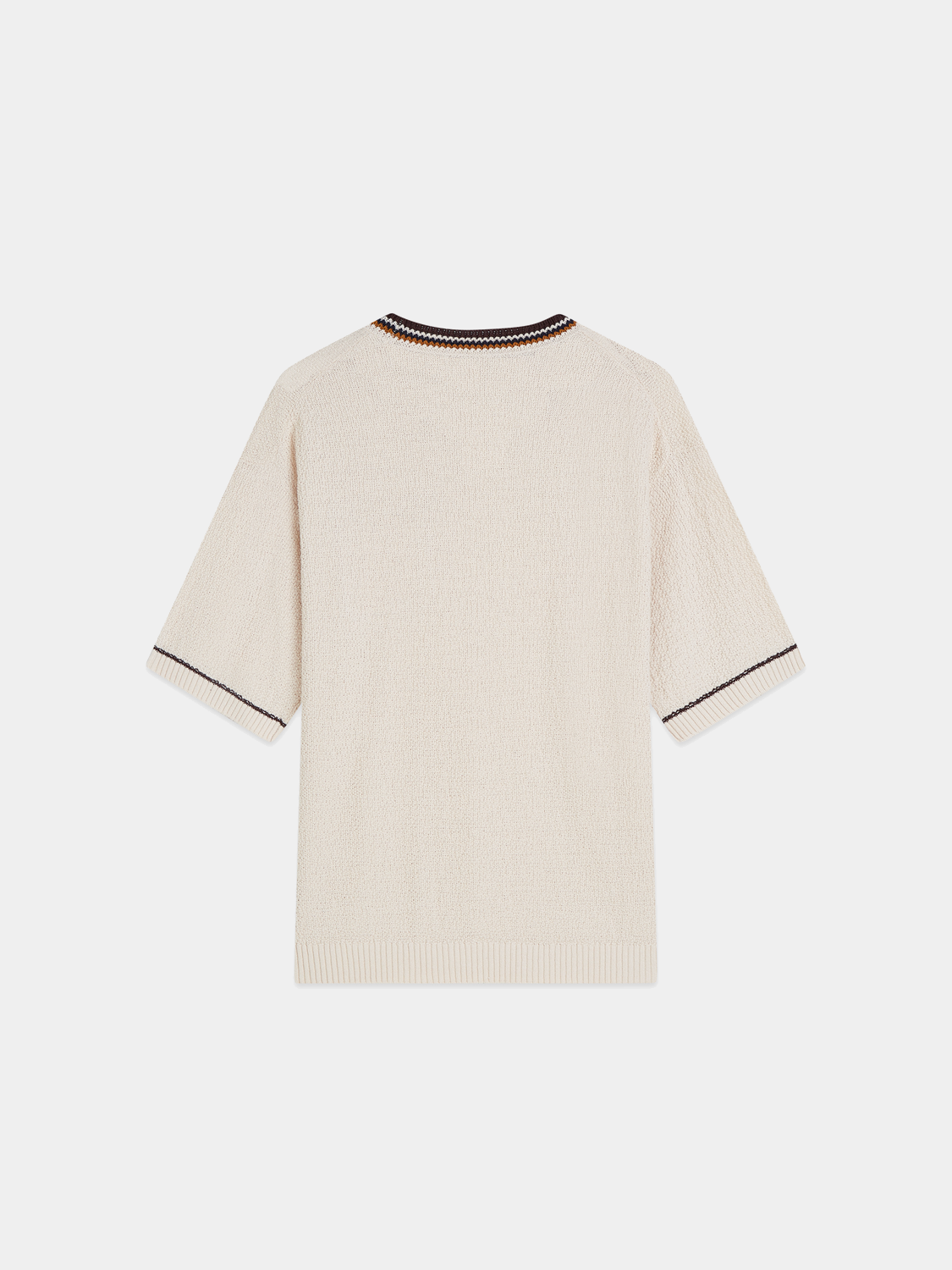 Knitted t-shirt by Scotch & Soda, showcasing a close-up of the textured knit fabric and classic design.