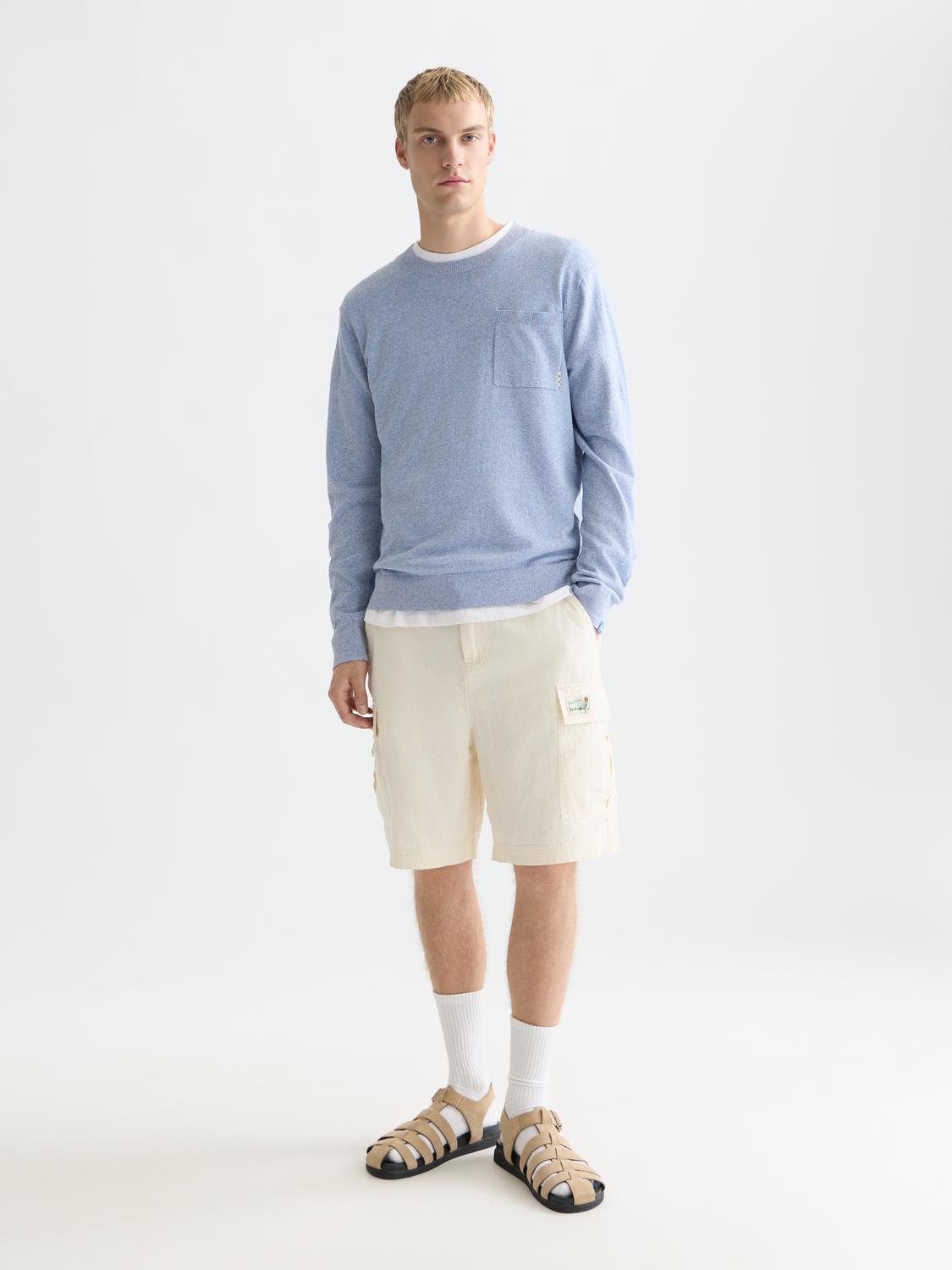 Linen-blend melange knitwear pullover from SCOTCH & SODA featuring a textured knit pattern and a relaxed fit.