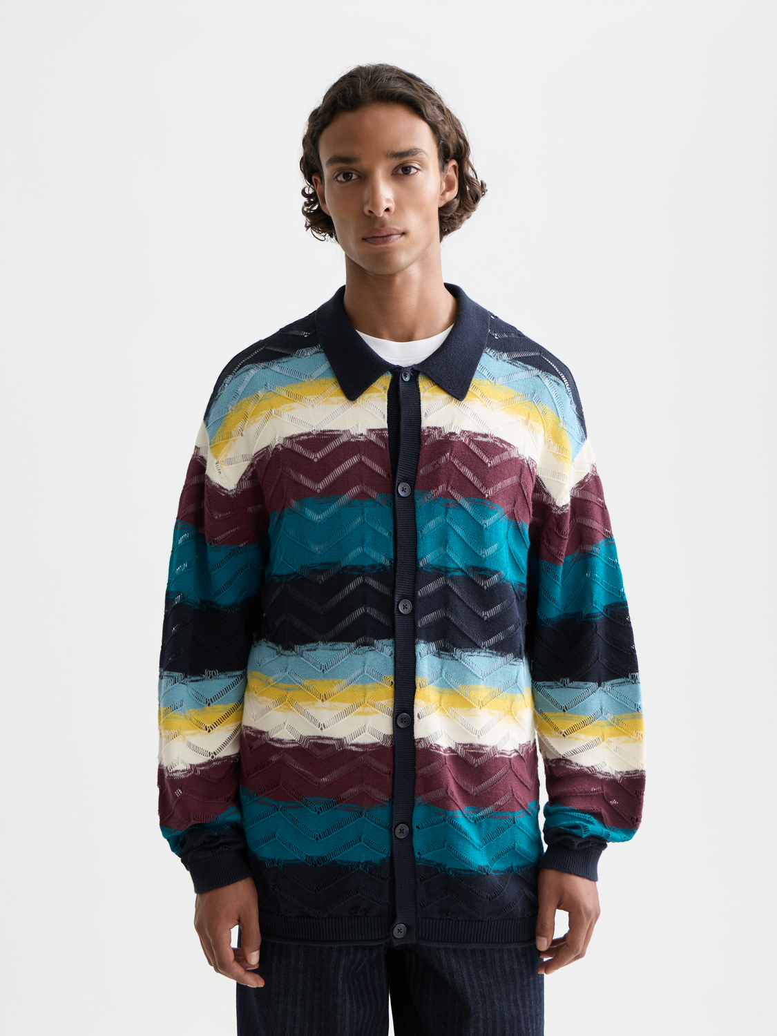 Open structure knit cardigan by Scotch & Soda featuring a relaxed fit and textured knit fabric, stylishly displayed on a neutral background.