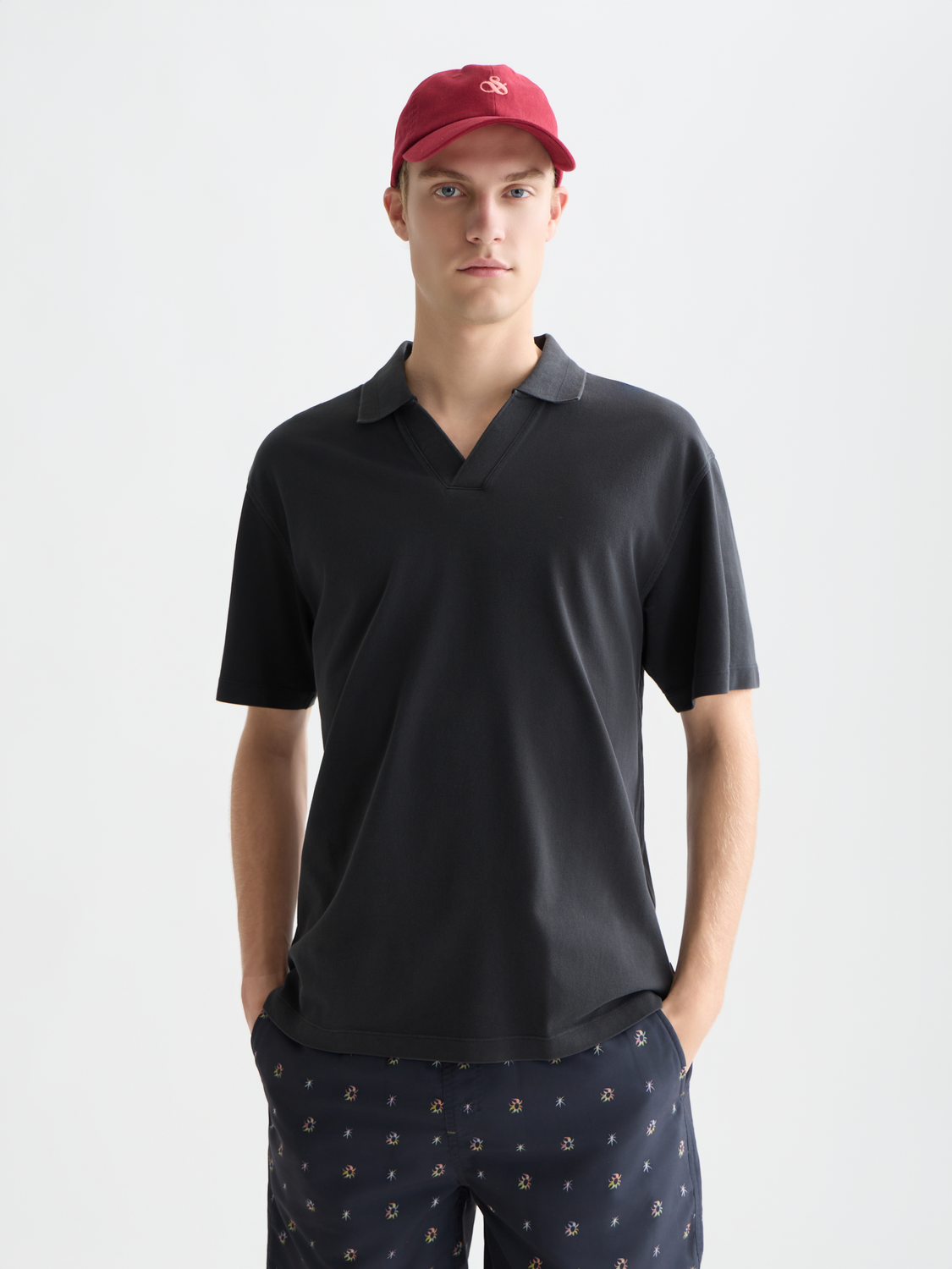 Blue Scotch & Soda pique polo shirt with a classic collar and short sleeves, displayed on a plain background.