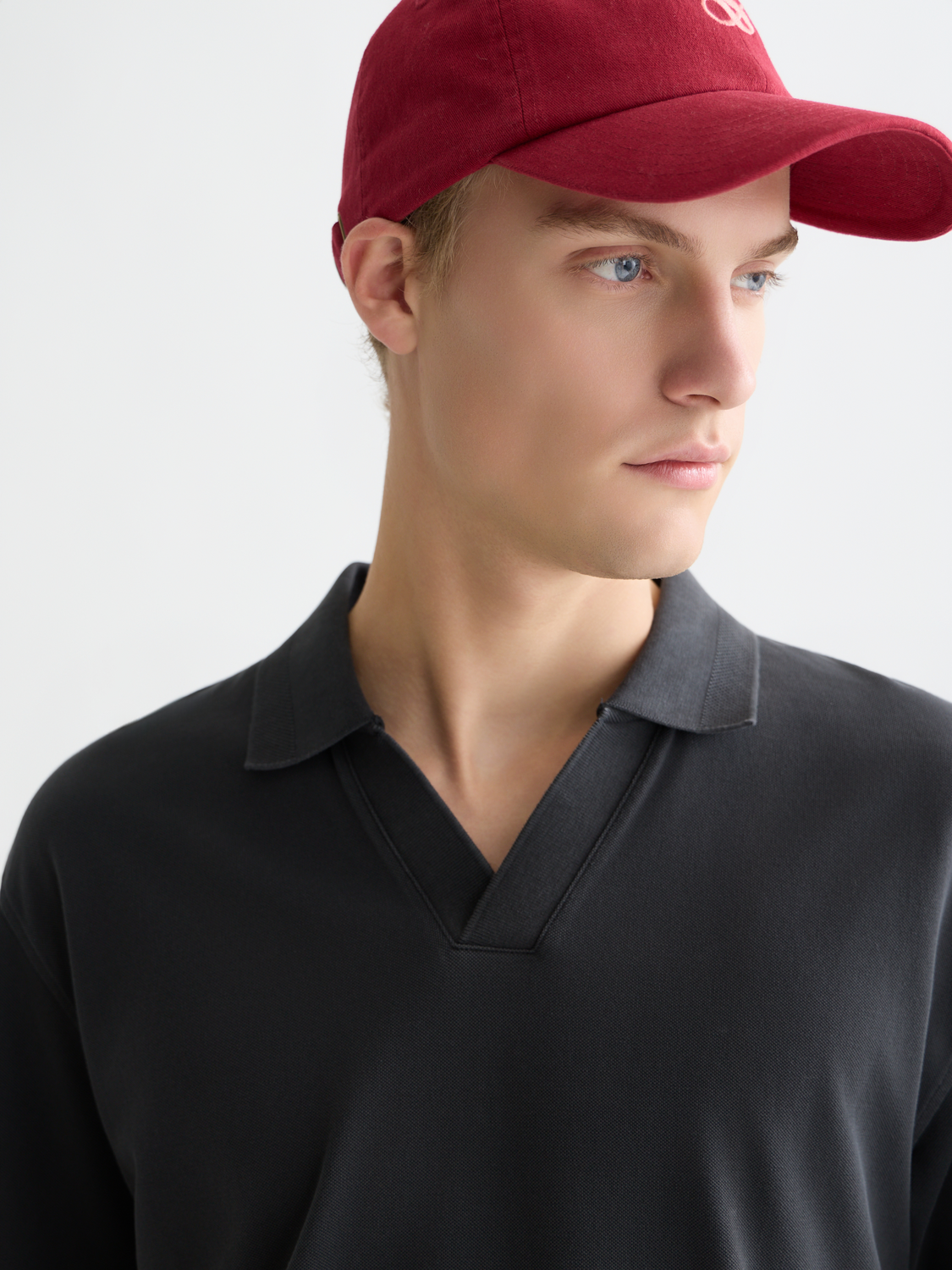 Navy Scotch & Soda pique polo shirt with a classic collar and short sleeves, displayed on a plain background