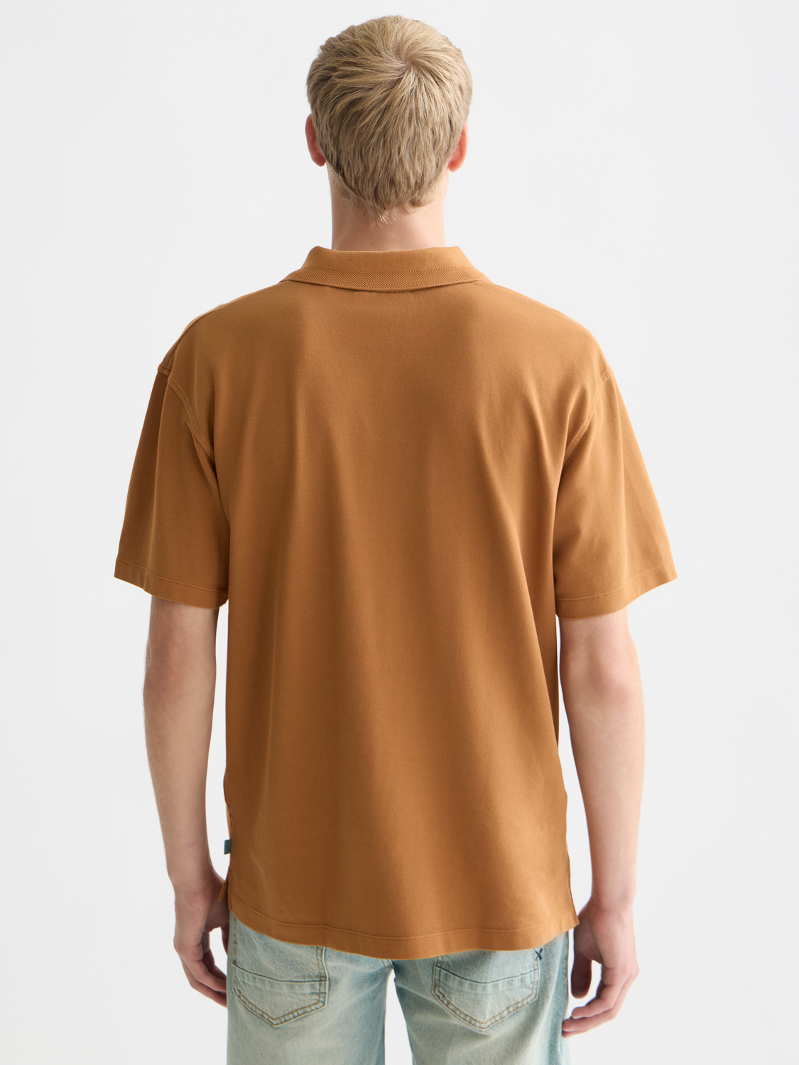 Navy Scotch & Soda pique polo shirt with collar and short sleeves, displayed from the back.