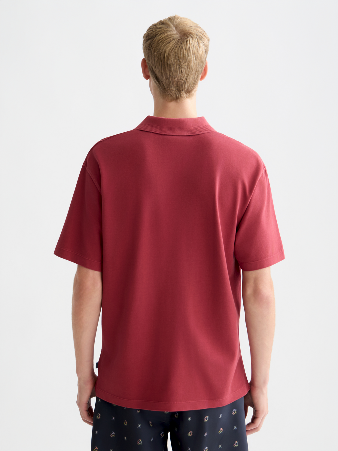 Navy Scotch & Soda pique polo shirt with collar and short sleeves, displayed from the back.