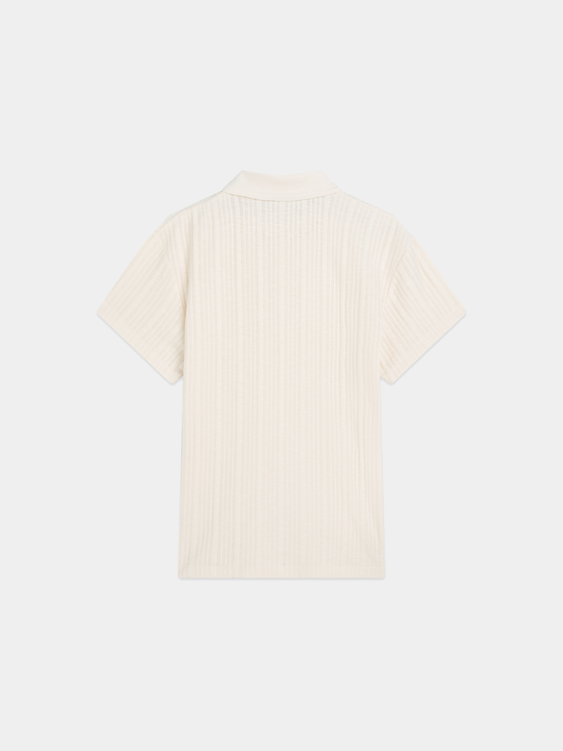Navy ribbed polo shirt by Scotch & Soda, featuring a classic collar and textured fabric, displayed on a plain background.