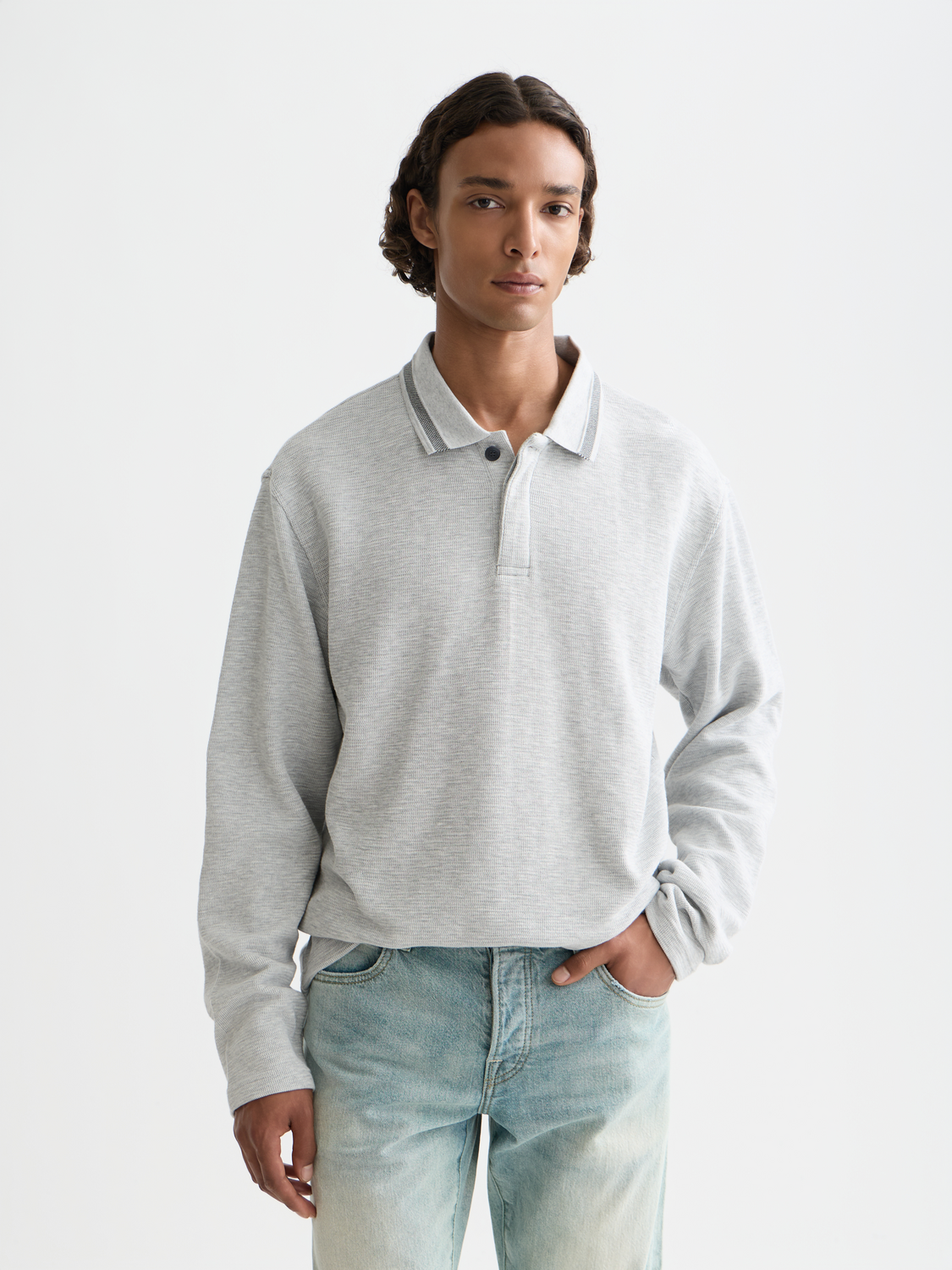 Long-sleeved polo shirt by Scotch & Soda in dark green with a classic collar and button-up front.