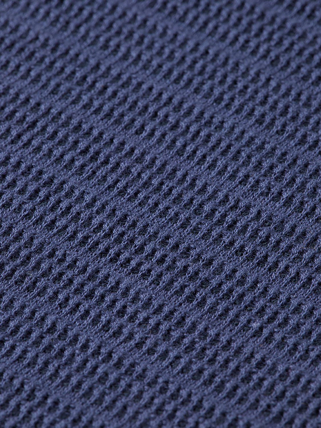 Structured knit polo shirt by Scotch & Soda featuring a classic design and textured fabric.