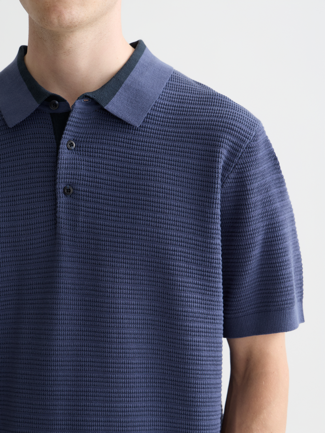 Structured knit polo shirt by Scotch & Soda featuring a classic fit and textured knit fabric.