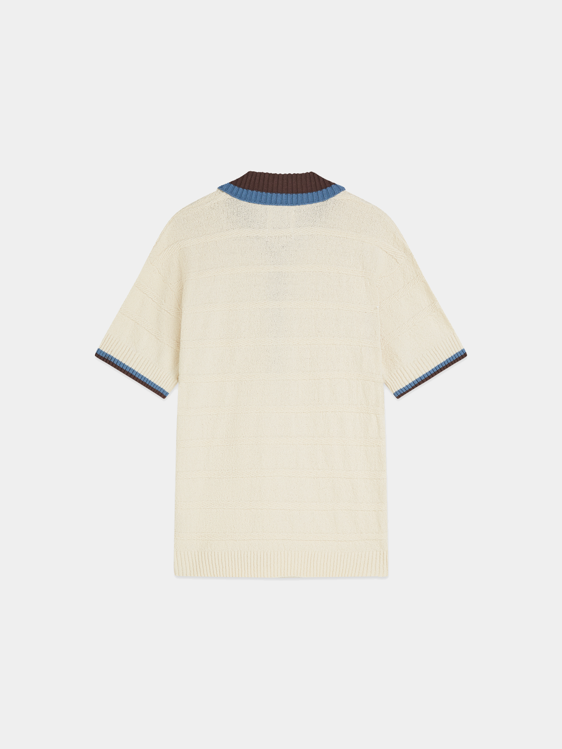 Knitted SCOTCH & SODA polo shirt in navy, featuring a classic collar and textured knit fabric.