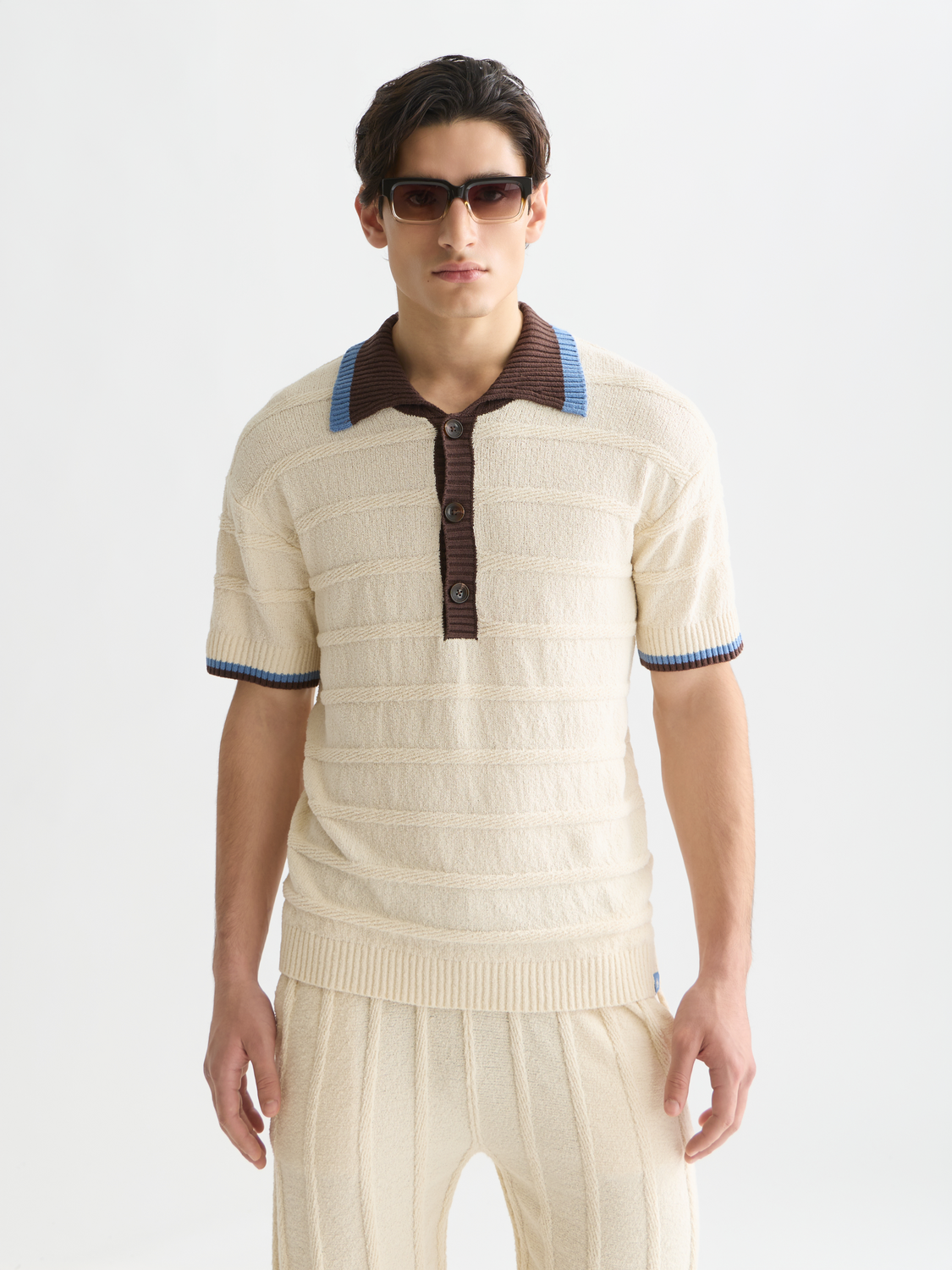 Scarlet red knitted polo shirt by Scotch & Soda featuring a classic collar and textured knit fabric.
