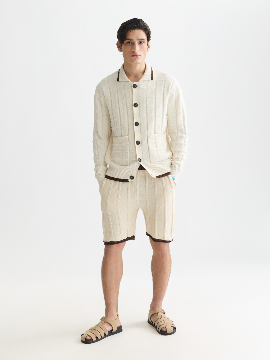 Structured boucle cardigan from Scotch & Soda, knitwear with a textured boucle pattern, front view showing button details.